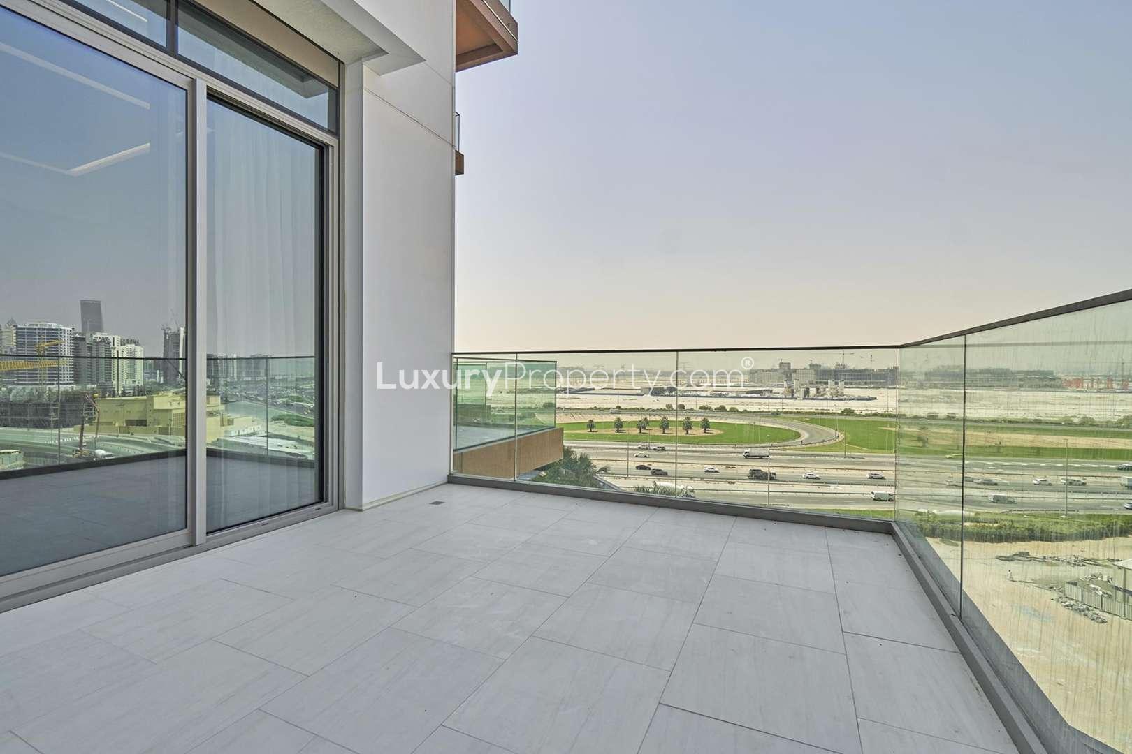 Luxurious gym at SLS Dubai Residences, Business Bay, with modern equipment and city views