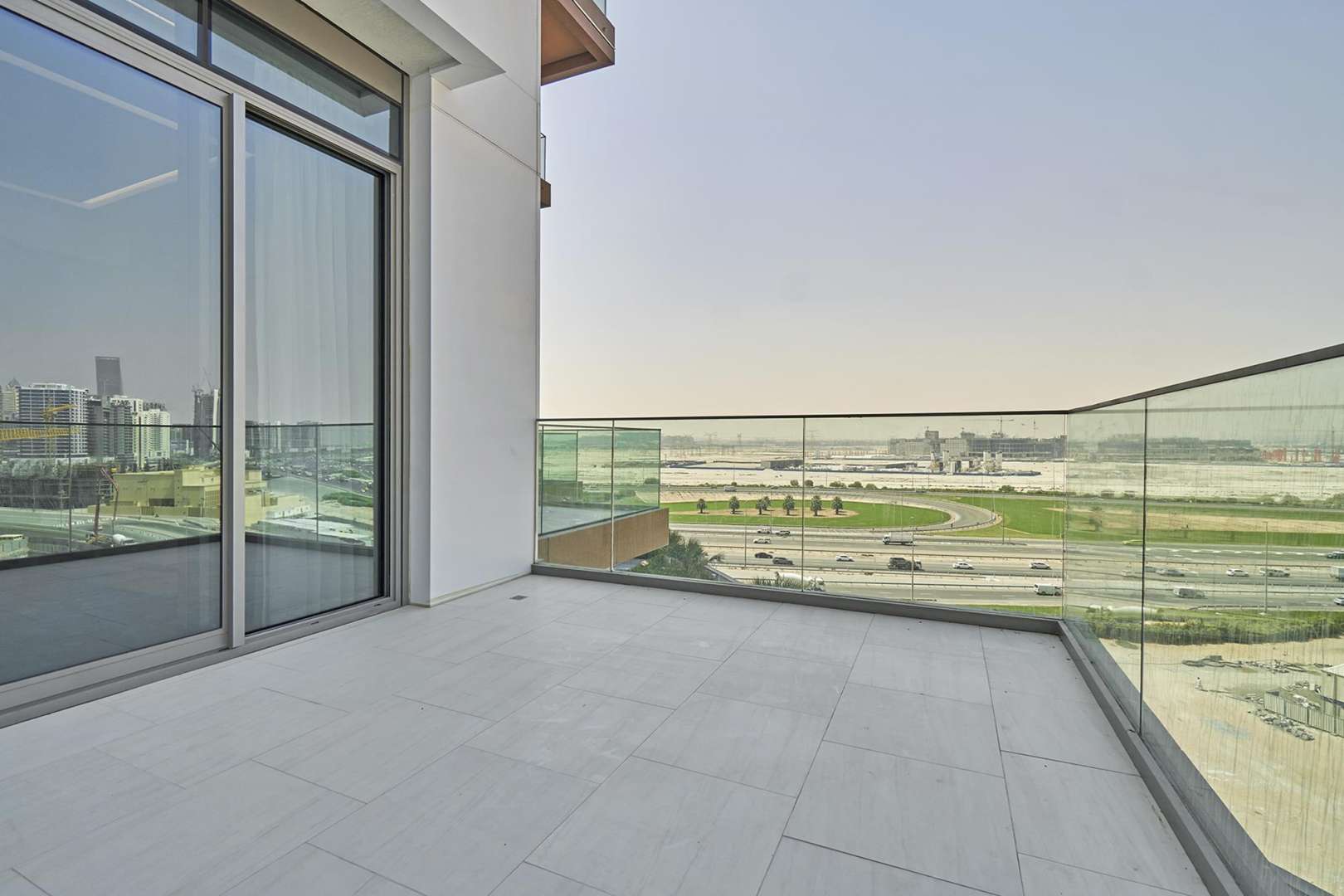 Luxurious gym at SLS Dubai Residences, Business Bay, with modern equipment and city views