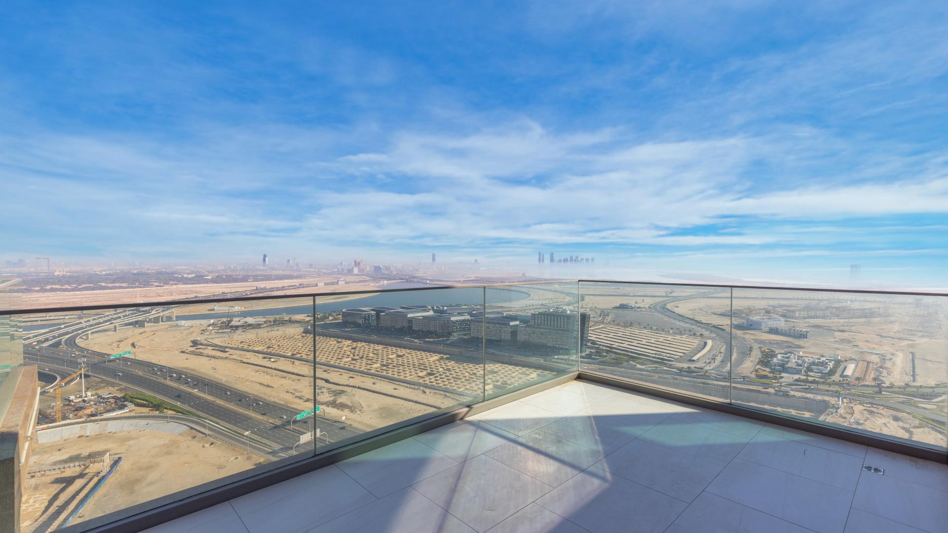 High ceilings and modern chandelier in one-bed apartment, SLS Dubai, Business Bay