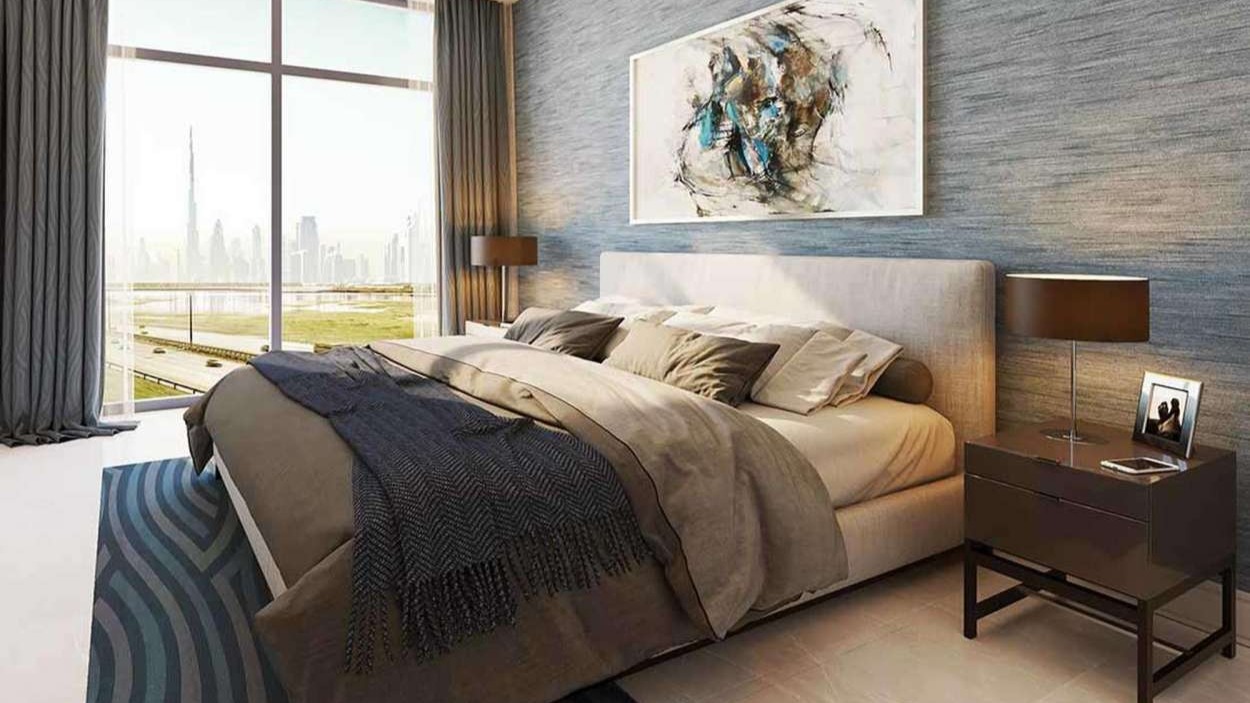 Luxurious pool area at Sobha Creek Reserve apartment, Dubai, with city skyline views