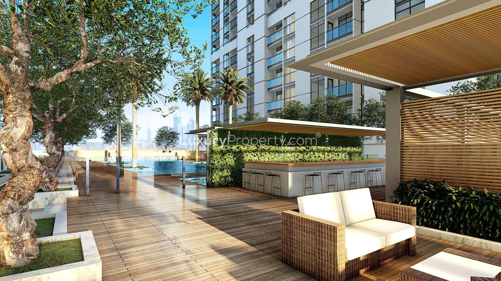 Luxurious outdoor terrace with pool at Sobha Hartland apartment, Mohammed Bin Rashid City