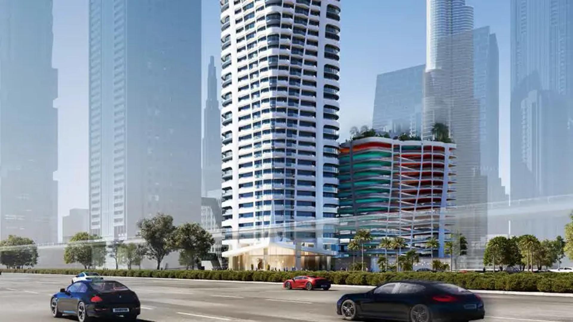 Aerial view of Volta apartment tower, Downtown Dubai, with ocean backdrop