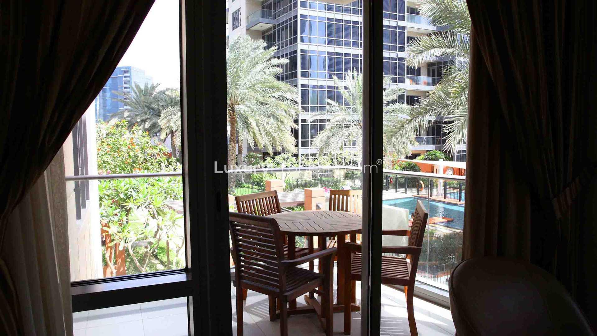 Living room in one-bedroom apartment, South Ridge 1, Downtown Dubai, with garden view