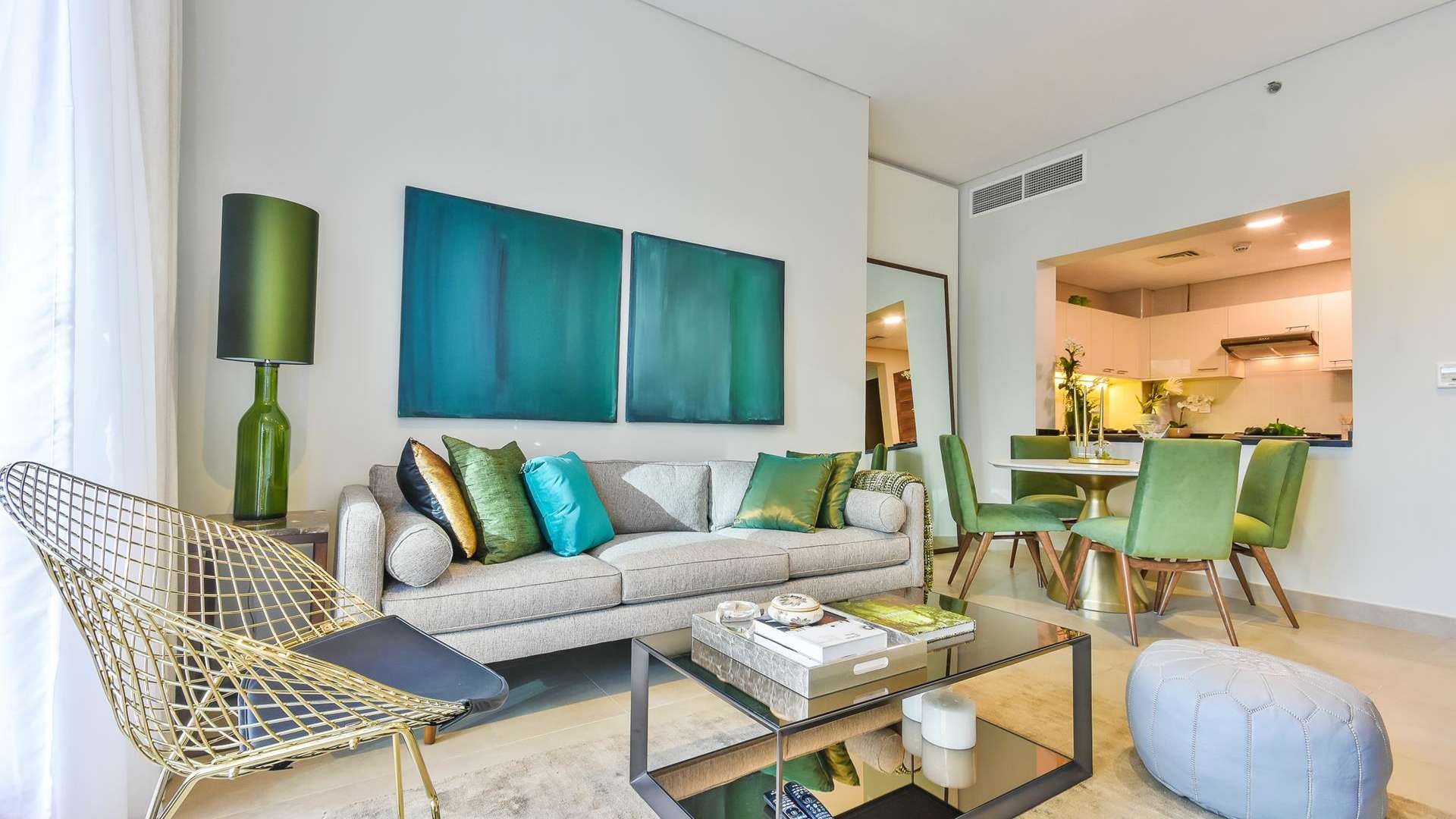 Dining area and kitchen in one-bed apartment at Sparkle Towers, Dubai Marina for sale