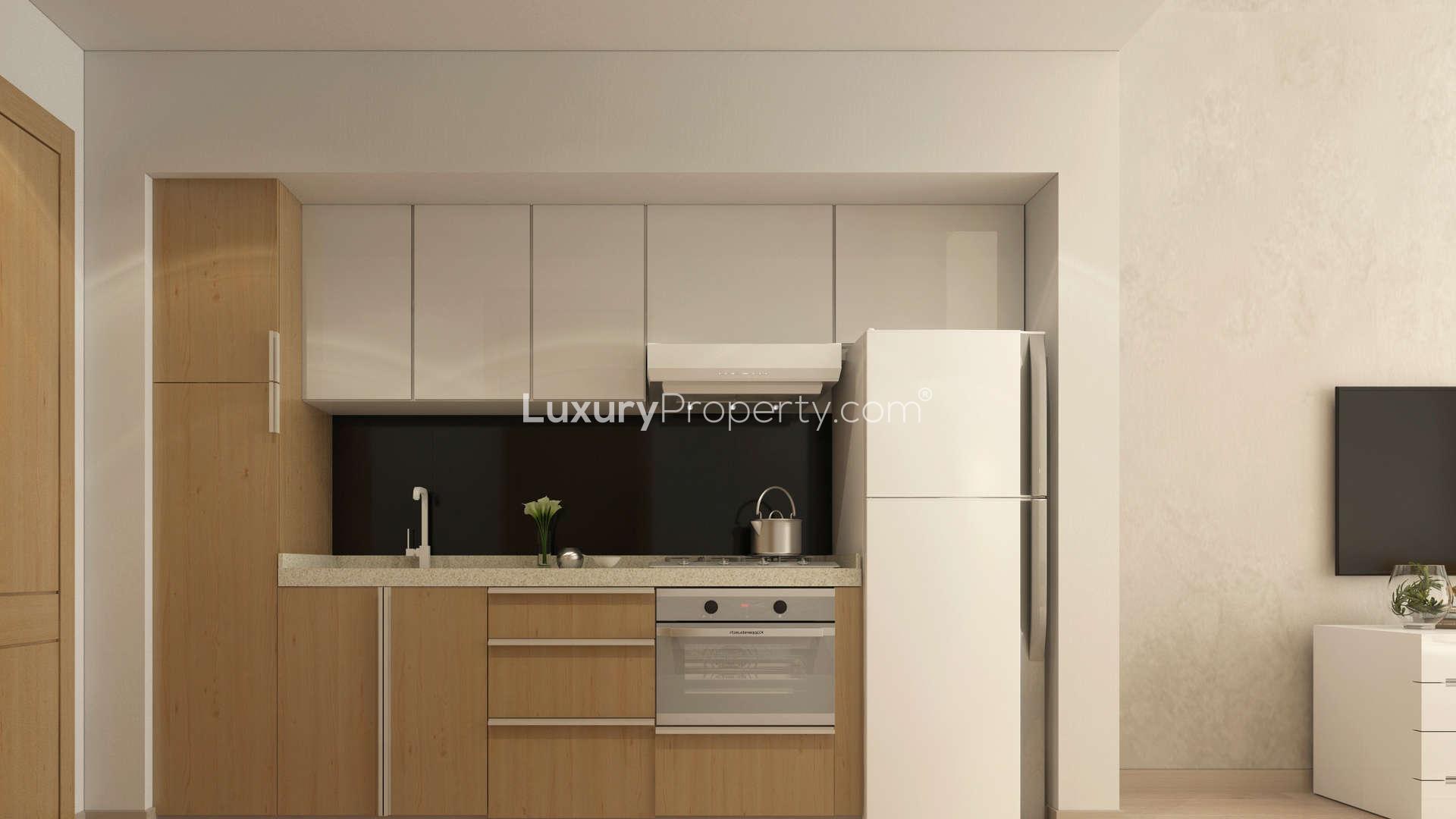 Modern living and dining area in Studio 101 apartment, Dubai Studio City