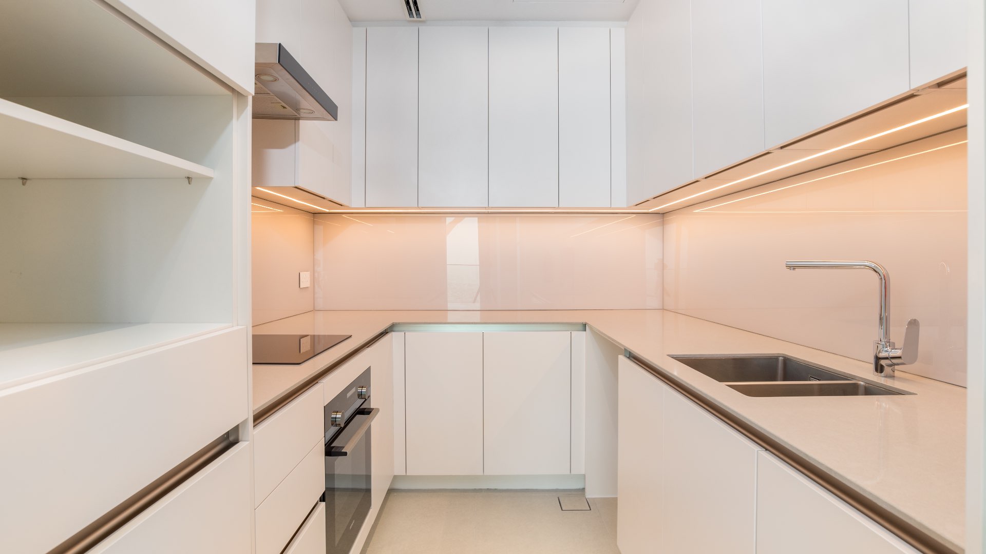"Spacious living area in luxury one-bedroom apartment, The Address Jumeirah, Jumeirah Beach Residence.",Modern kitchen in luxury one-bedroom apartment, The Address Jumeirah, Jumeirah Beach Residence