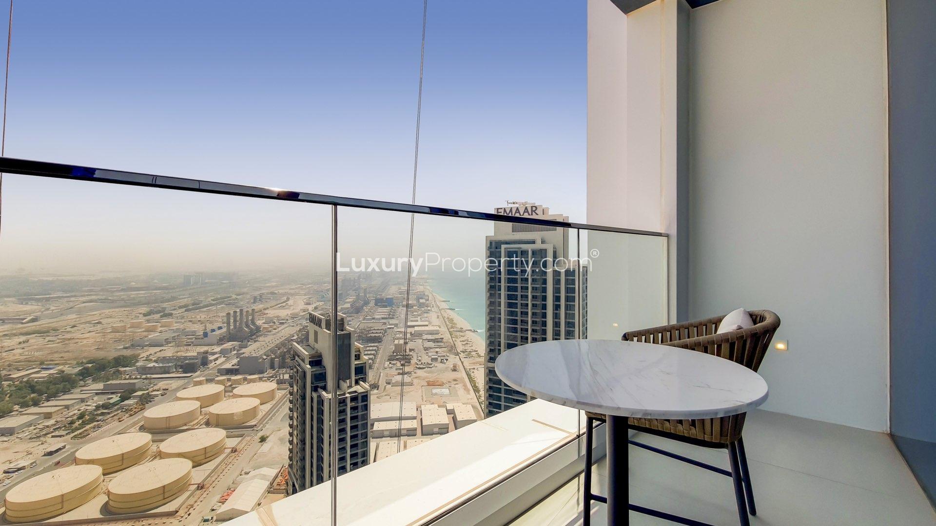 Modern living room in Jumeirah Beach Residence apartment, featuring stylish furniture and natural light
