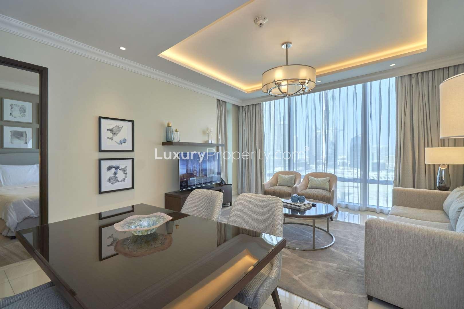 N/A,Brand new Downtown Dubai apartment interior, modern furnishings, large windows, natural light