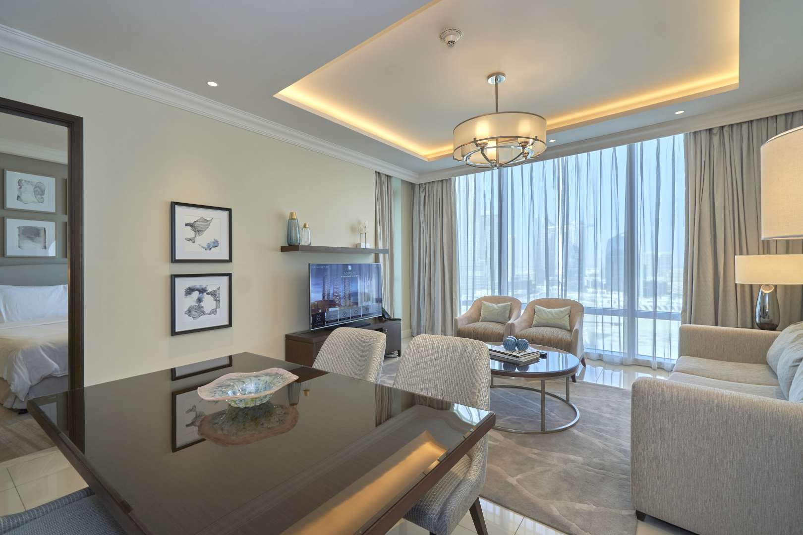 N/A,Brand new Downtown Dubai apartment interior, modern furnishings, large windows, natural light