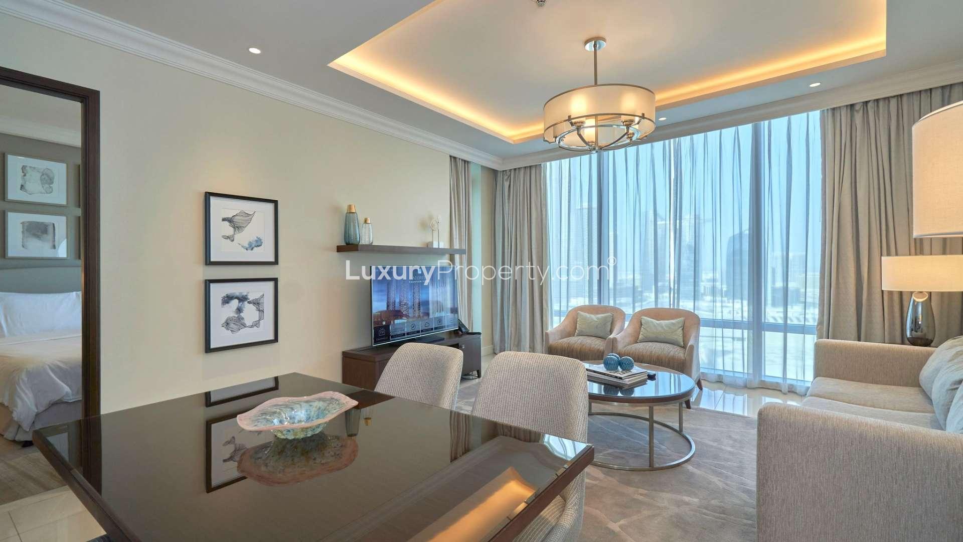 "Balcony view of Burj Khalifa from luxury apartment in Downtown Dubai, The Address Residence.",Luxury apartment living room with Burj Khalifa views, Downtown Dubai, modern decor