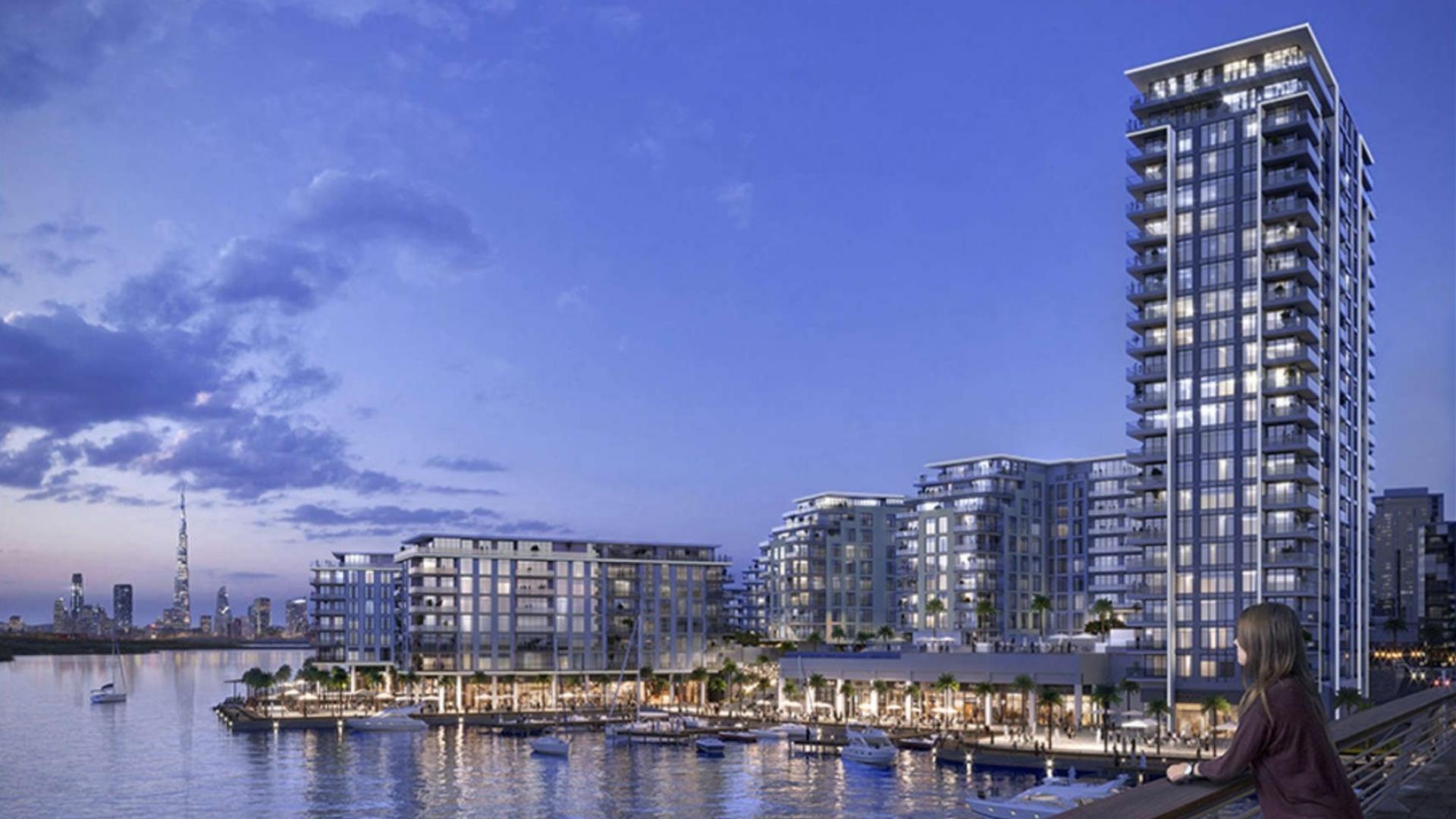 Luxurious living room with waterfront view in The Cove, Dubai Creek Harbour apartment