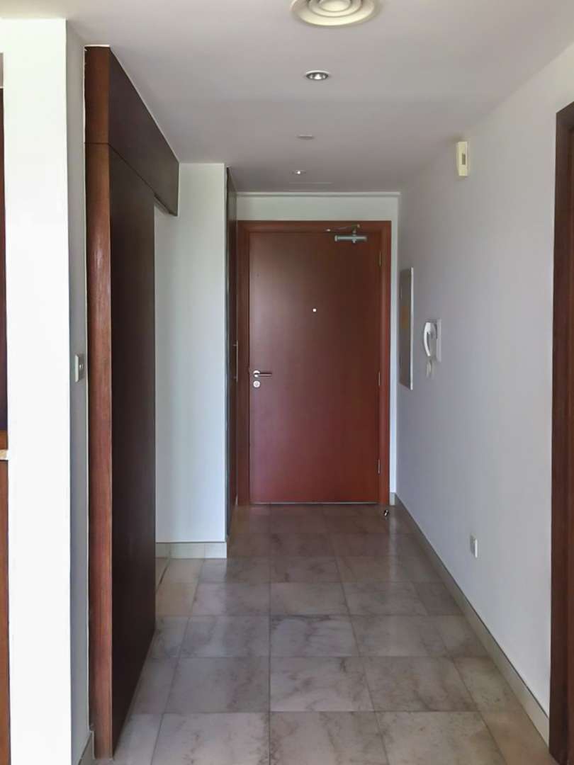 "Bright apartment interior with large window showcasing golf views in The Fairways, The Views.","Spacious hallway in The Fairways apartment, The Views, with elegant wooden door and tiles.","Bright apartment interior with large windows offering scenic golf course views in The Fairways.",Modern bathroom in The Fairways apartment, featuring bathtub, shower, and tiled walls