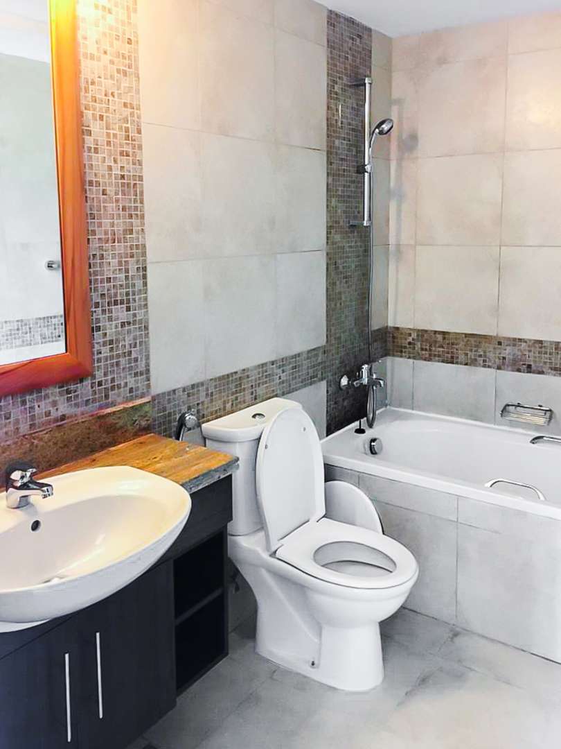 Front-load washing machine in villa closet, The Fairways, The Views, LP09673