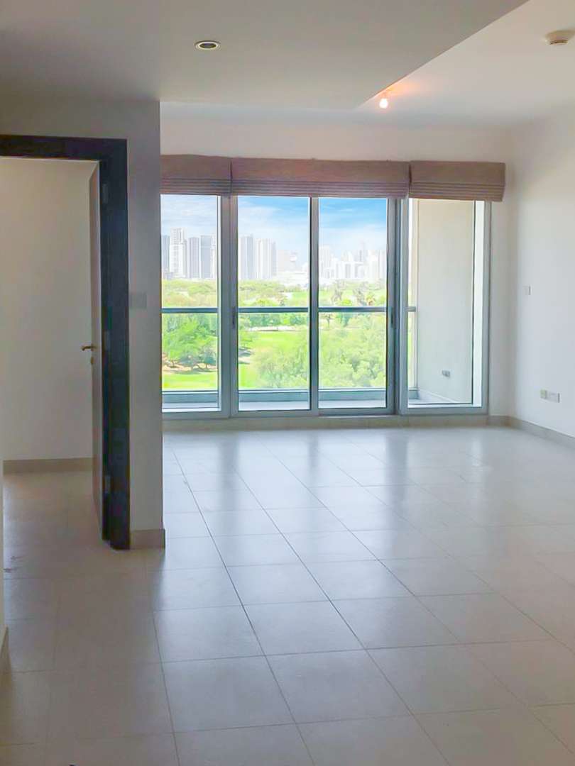 Modern bathroom in The Fairways apartment, featuring elegant tiles and a bathtub