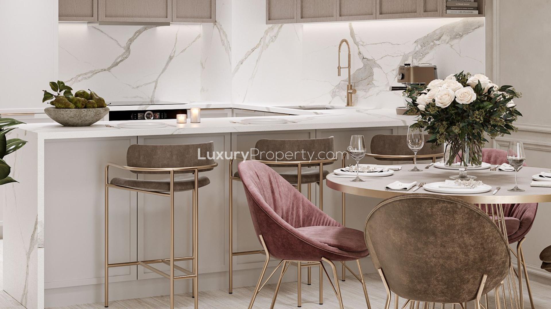 Designer-finished kitchen and dining area in Q Gardens Lofts apartment, Jumeirah Village Circle