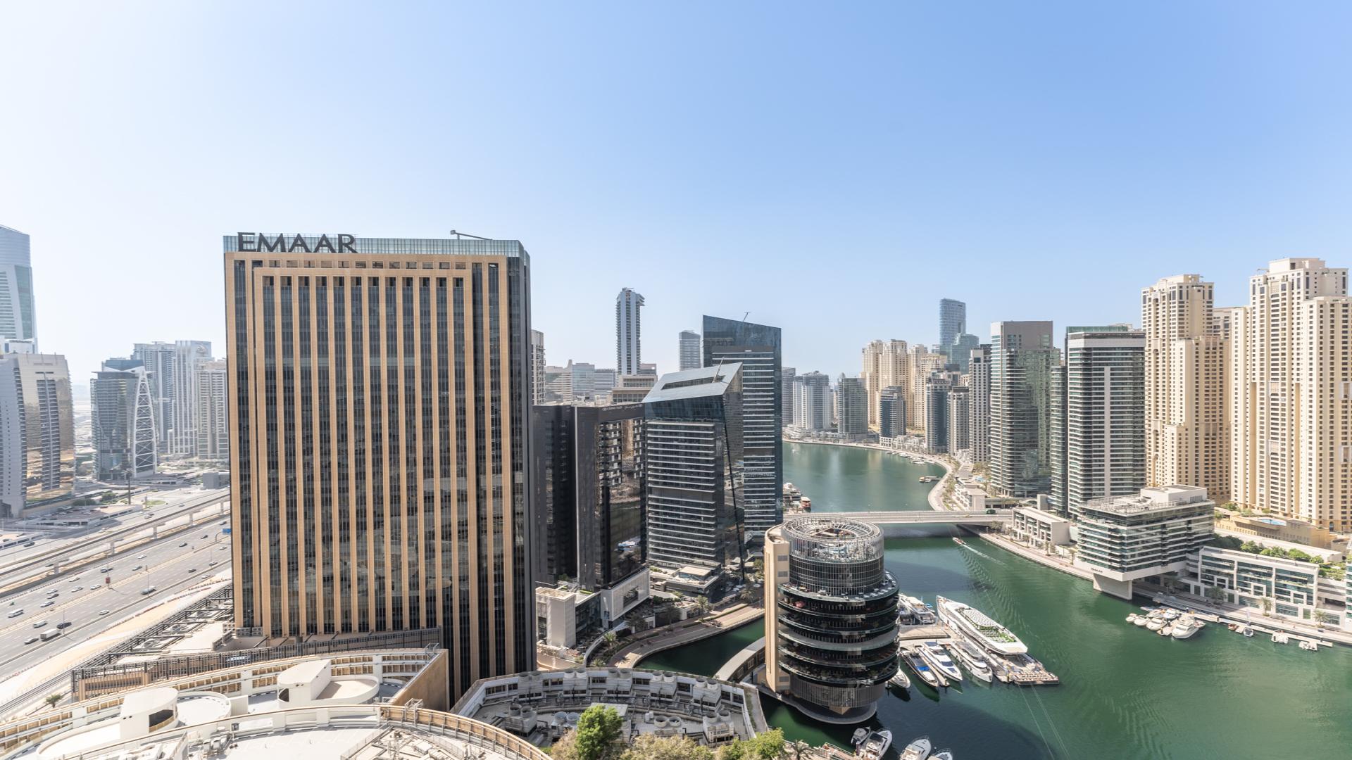 Balcony view of Dubai Marina skyline from 1-bed apartment in JW Marriott, Dubai Marina
