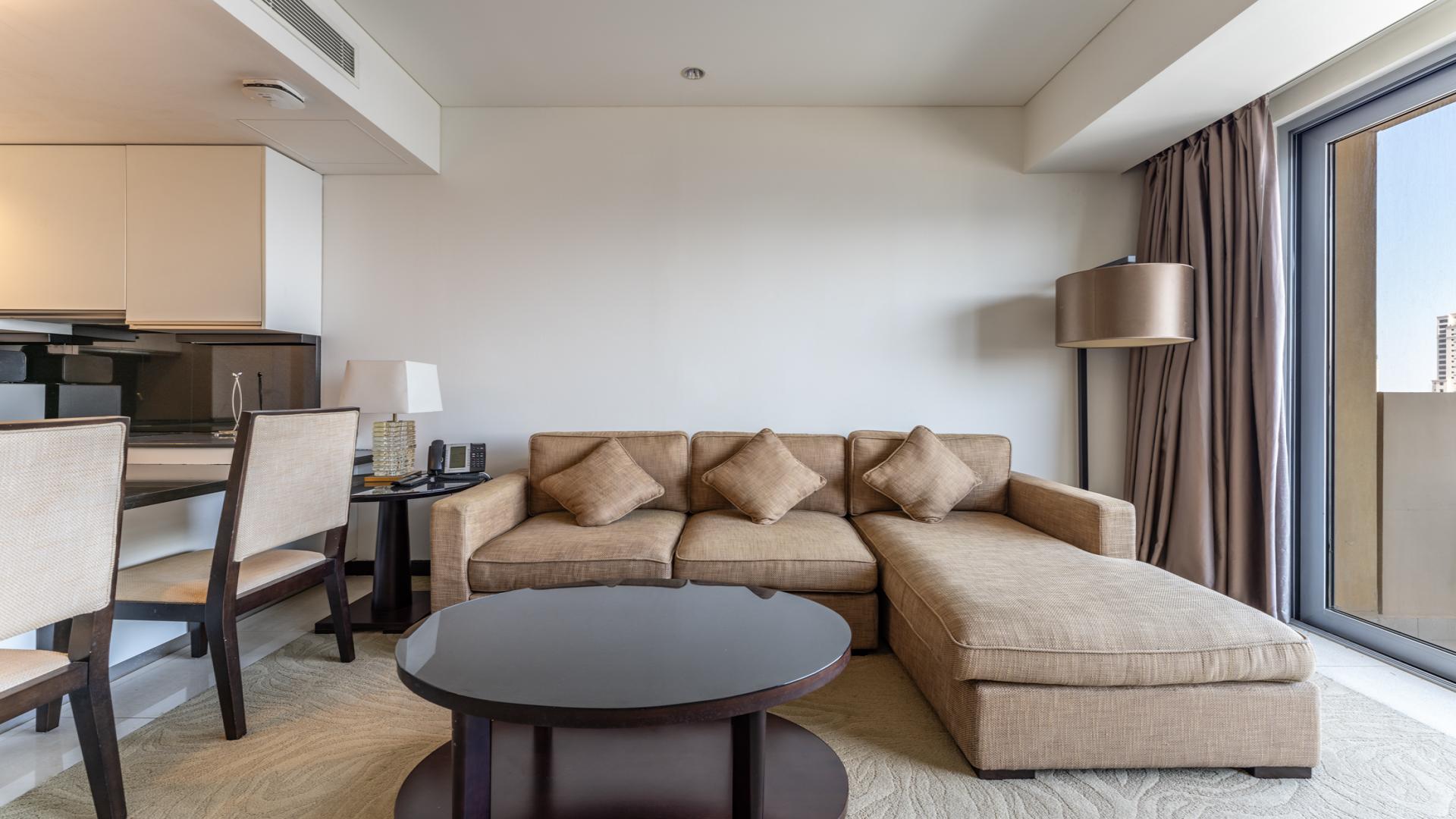 Modern living room in 1-bedroom apartment at The Address Dubai Marina, for sale