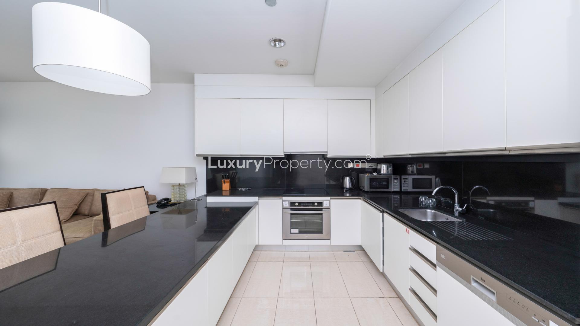 Modern kitchen in one-bedroom apartment, Dubai Marina, JW Marriott Hotel Marina, sleek design