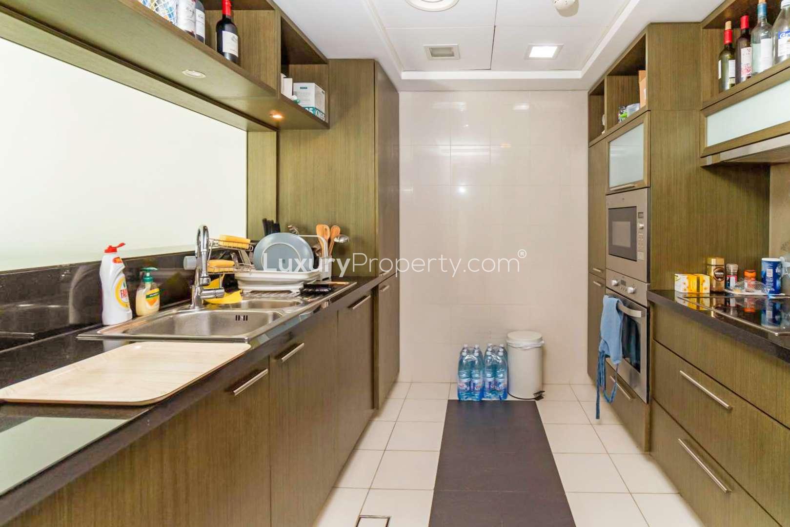 Modern kitchen in one-bedroom apartment, The Lofts, Downtown Dubai, for sale