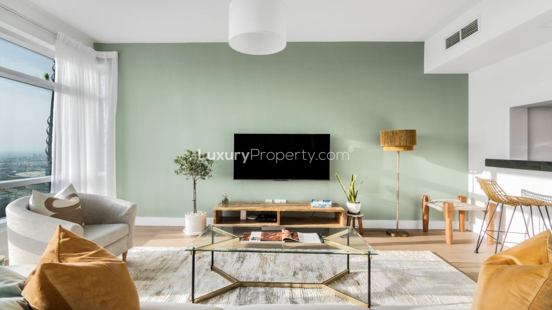 Modern living room in fully upgraded Downtown Dubai apartment, featuring stylish decor and furnishings