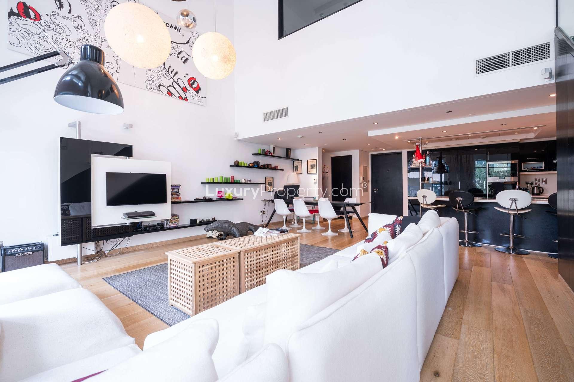 Balcony view of lush greenery in 1-bedroom duplex, The Lofts, Downtown Dubai