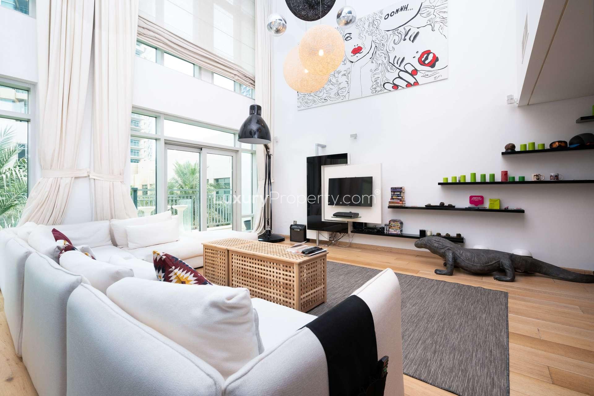 Modern living room in 1-bedroom duplex apartment, The Lofts, Downtown Dubai. Bright and spacious