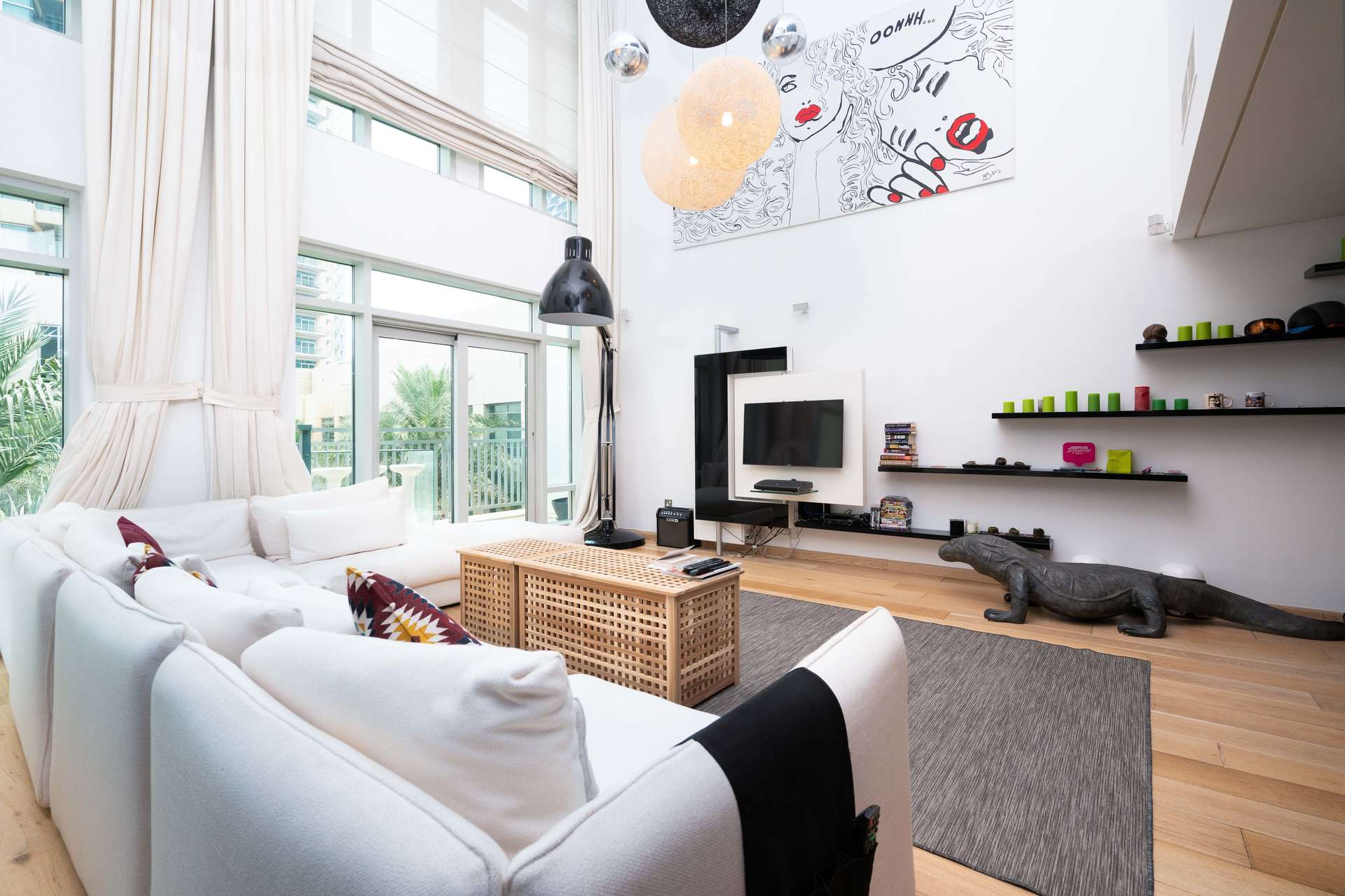 Modern living room in 1-bedroom duplex apartment, The Lofts, Downtown Dubai. Bright and spacious