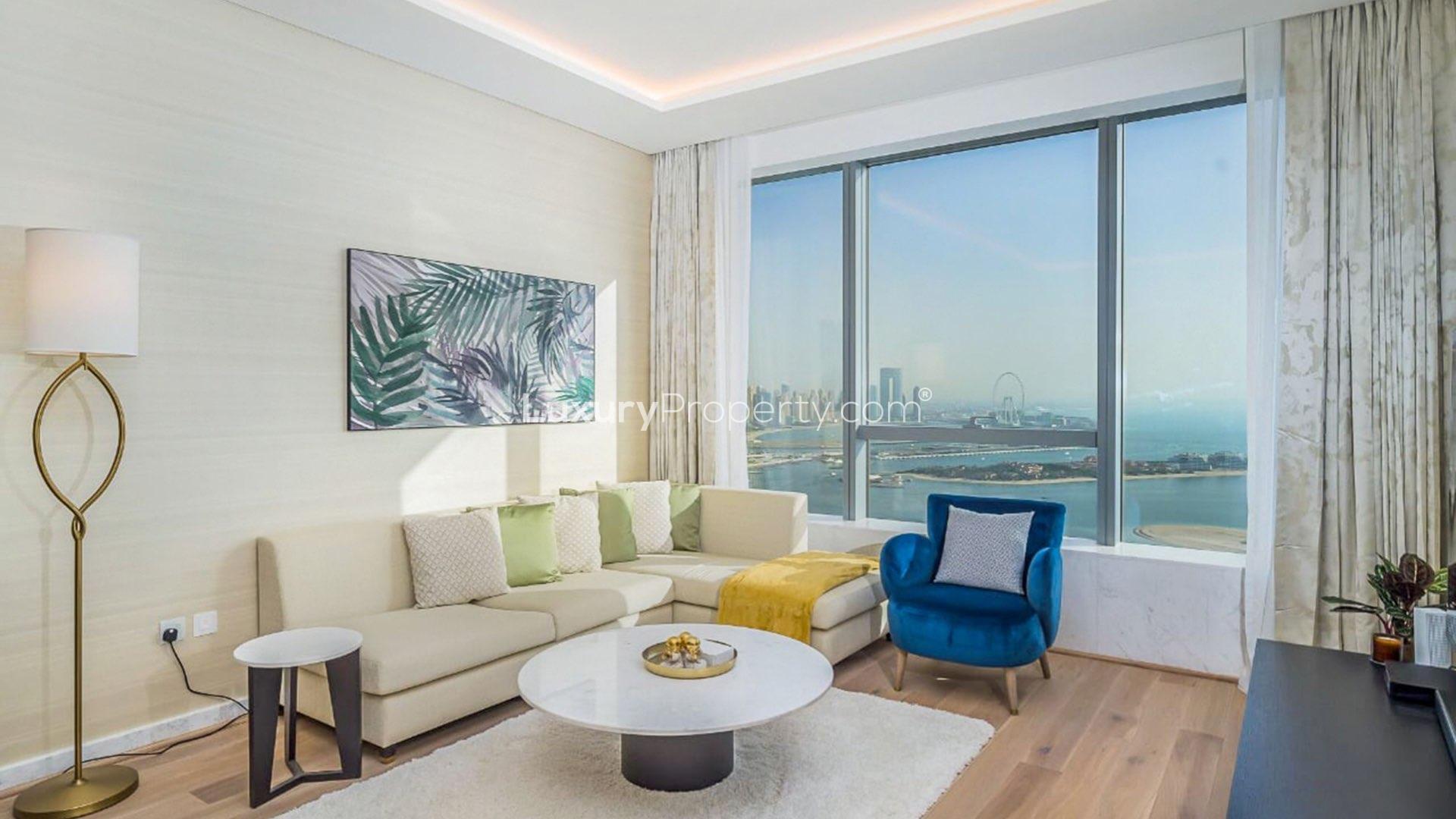 High-floor Palm Jumeirah apartment interior with marina views, modern decor, and dining area