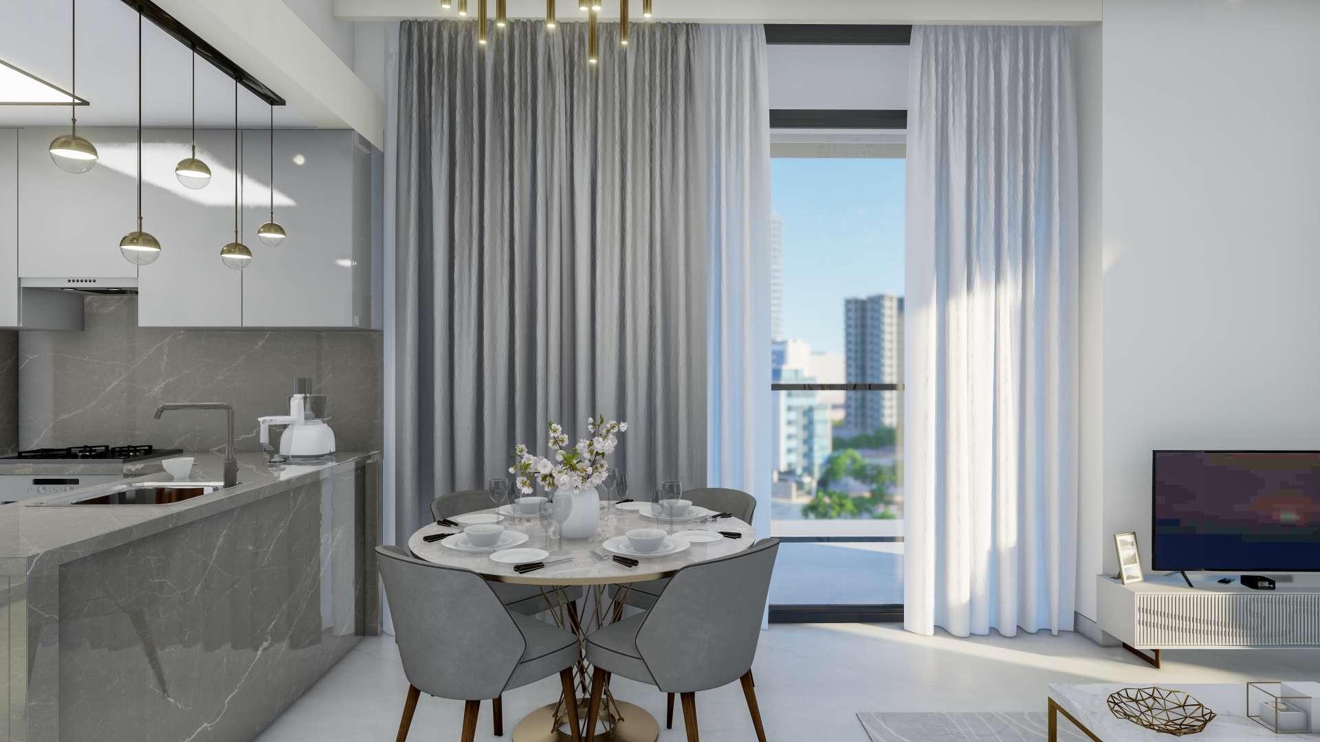 Modern kitchen and dining area in 1-bedroom apartment at The Paragon, Business Bay