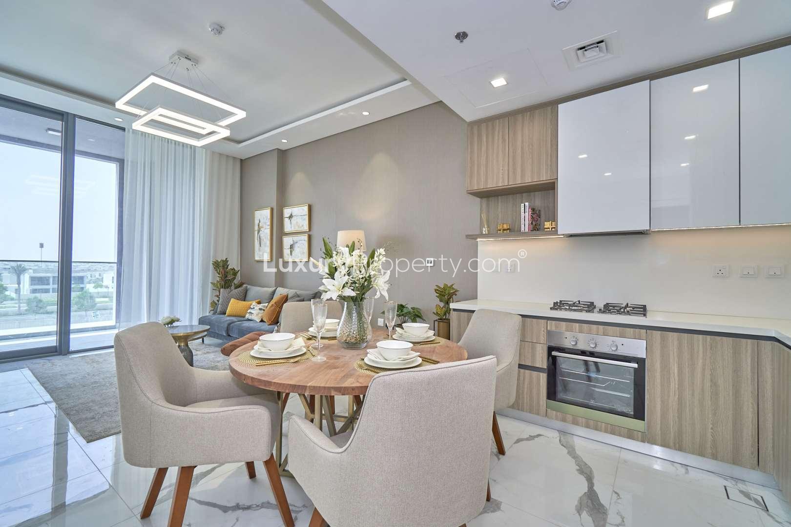 N/A,Modern open-plan kitchen and dining area in Dubai Hills Estate apartment for sale