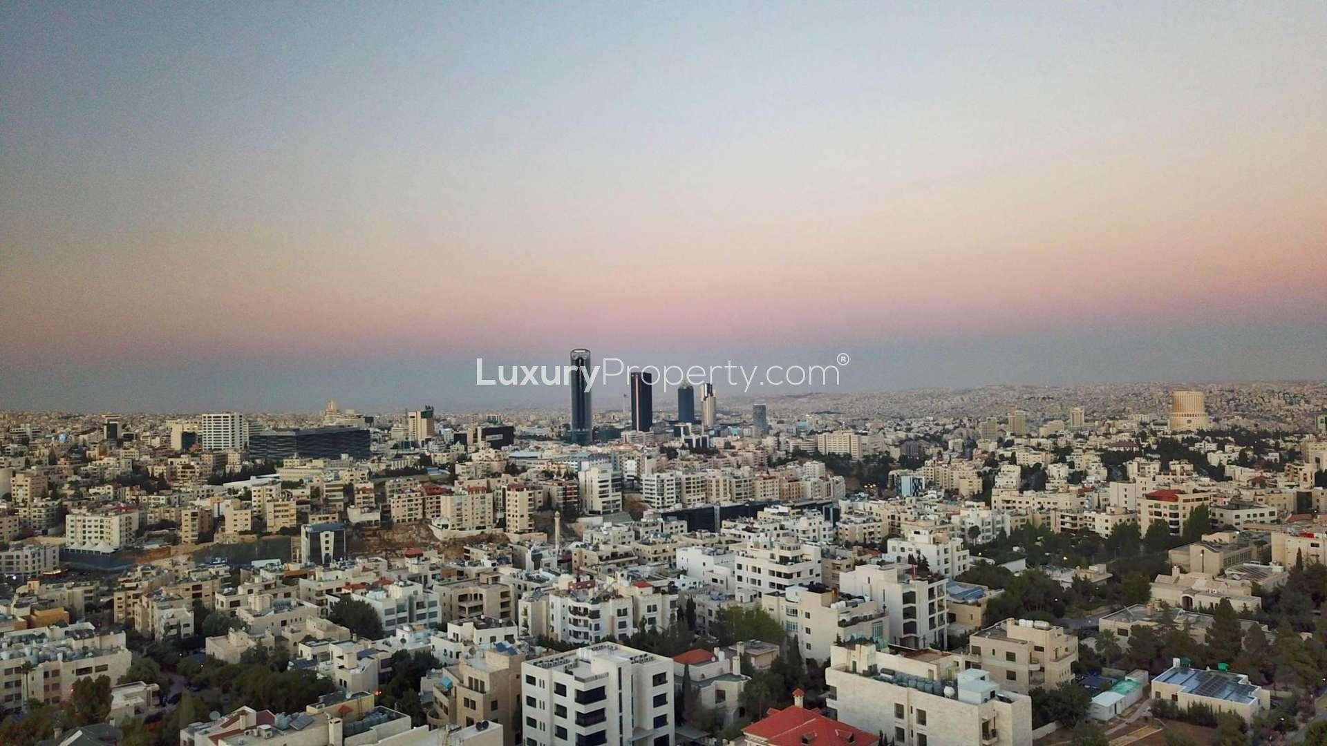 Stunning apartment at The Ritz-Carlton, Amman for sale, night view of building exterior