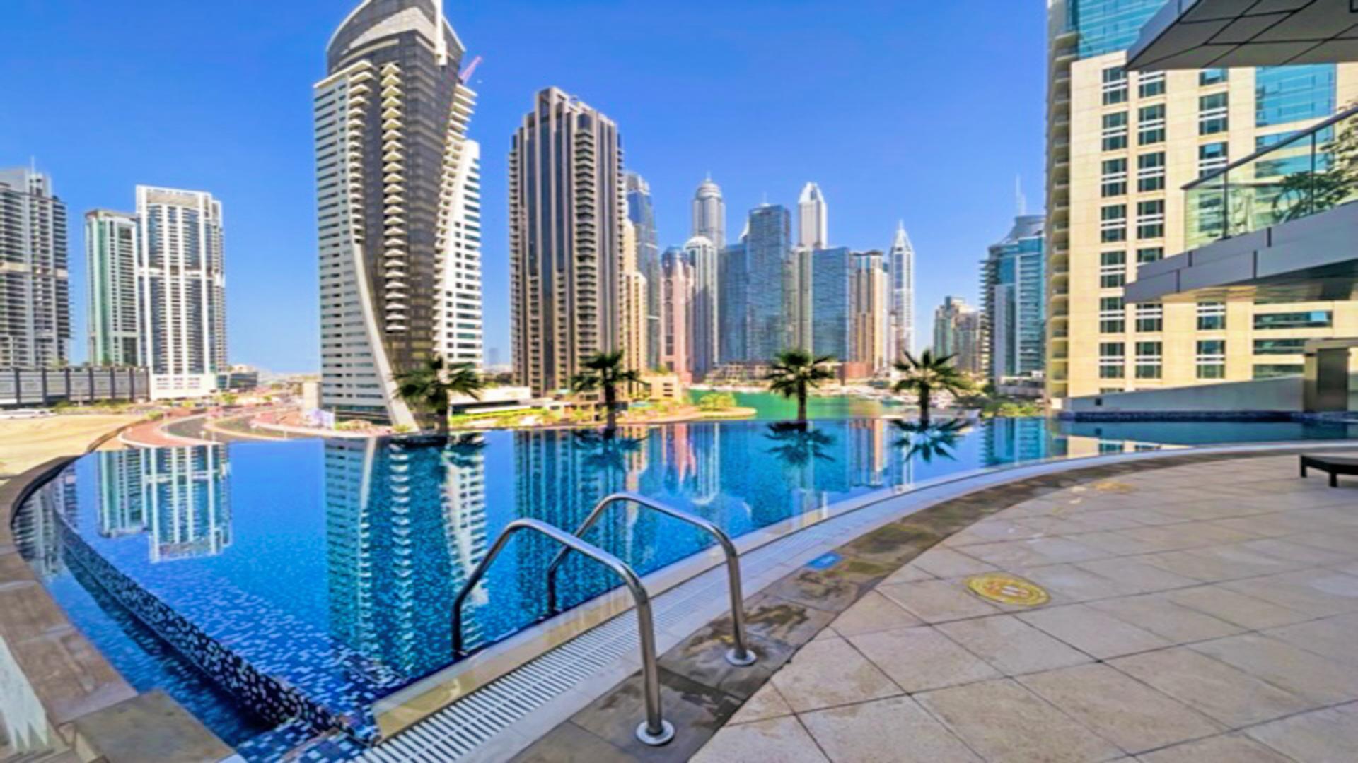 Modern living room in 1-bedroom apartment, Trident Bayside, Dubai Marina. Spacious layout, elegant decor