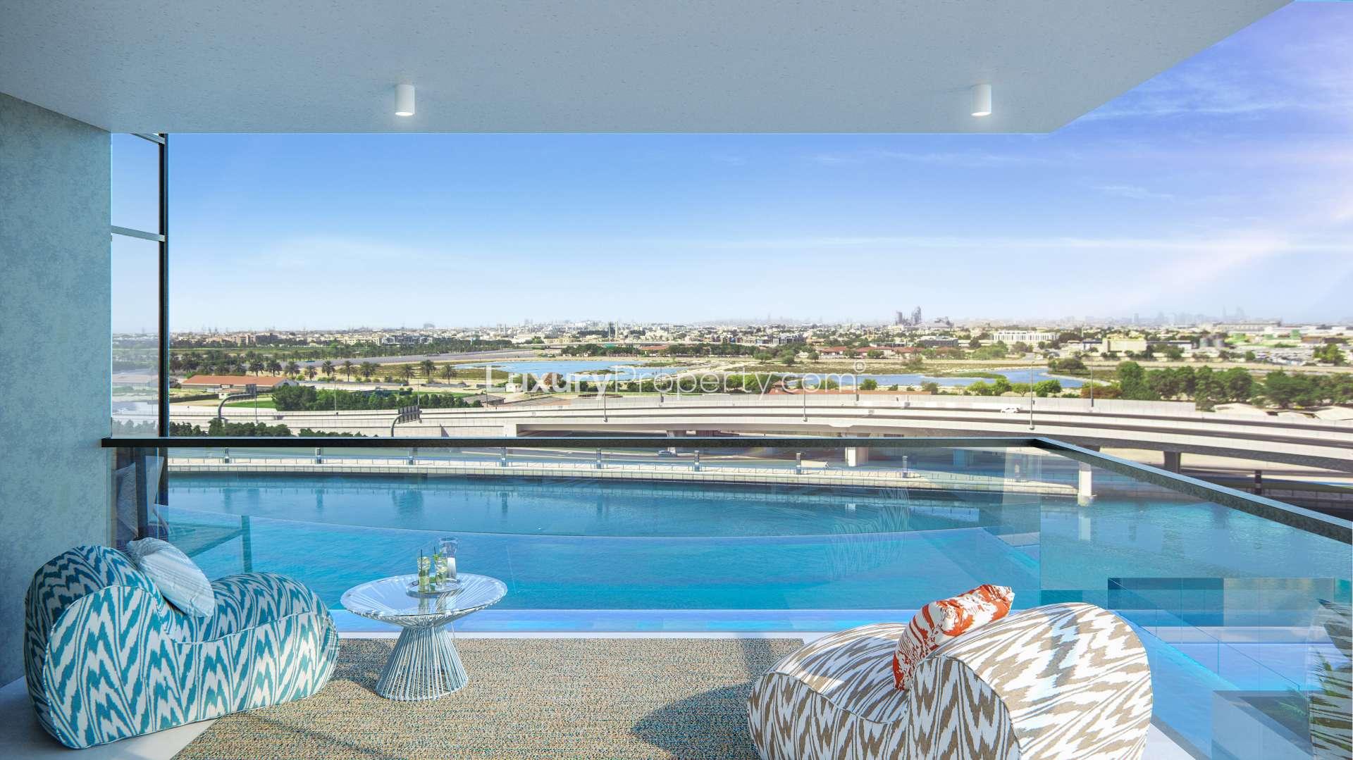 Luxury apartment tower overlooking Dubai Canal in Business Bay's Urban Oasis community