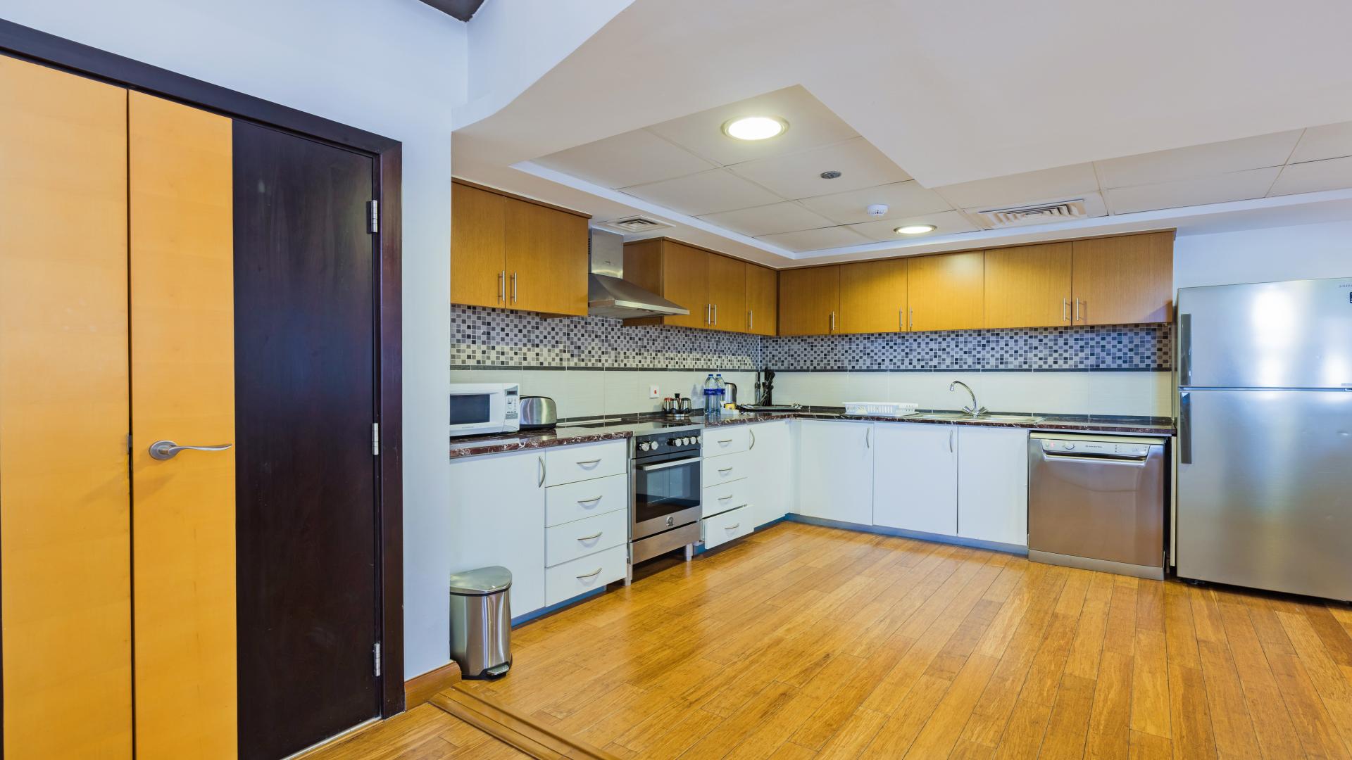 Duplex loft in JBR with modern staircase and spacious living area, Amwaj community