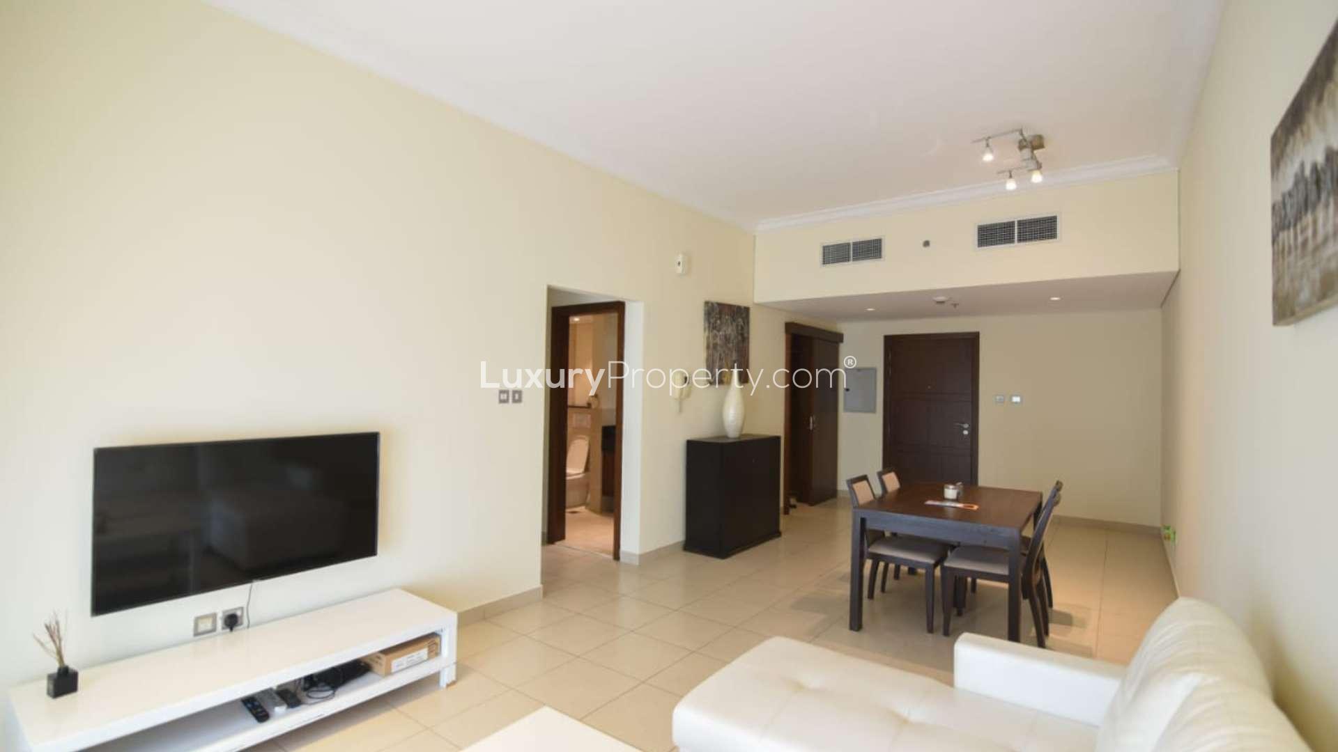 Vacant, fully furnished apartment living room with dining area, Downtown Dubai rental