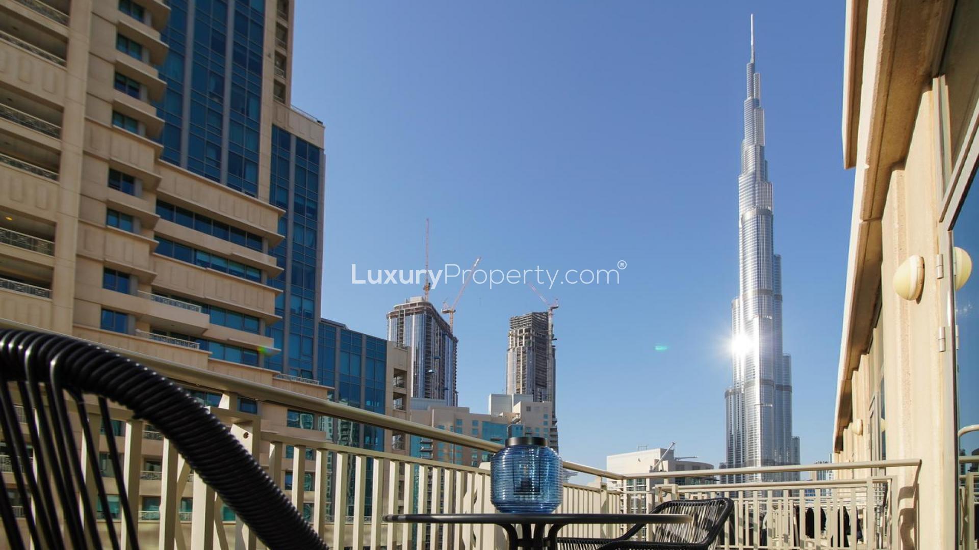 Luxurious living room in Downtown Dubai apartment, featuring elegant decor and modern furnishings