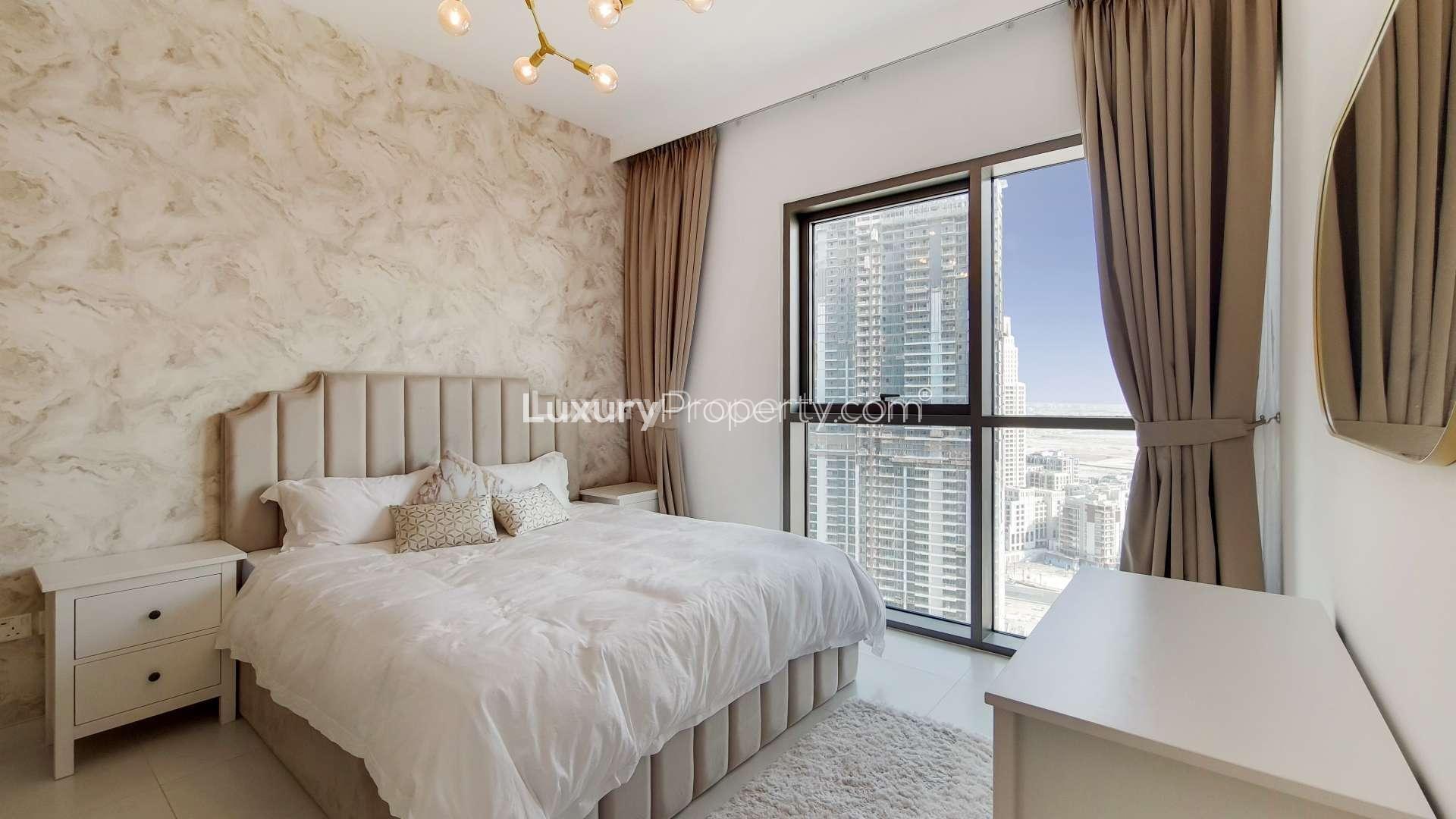 Modern kitchen and dining area in Creek Harbour furnished apartment, featuring sleek design elements