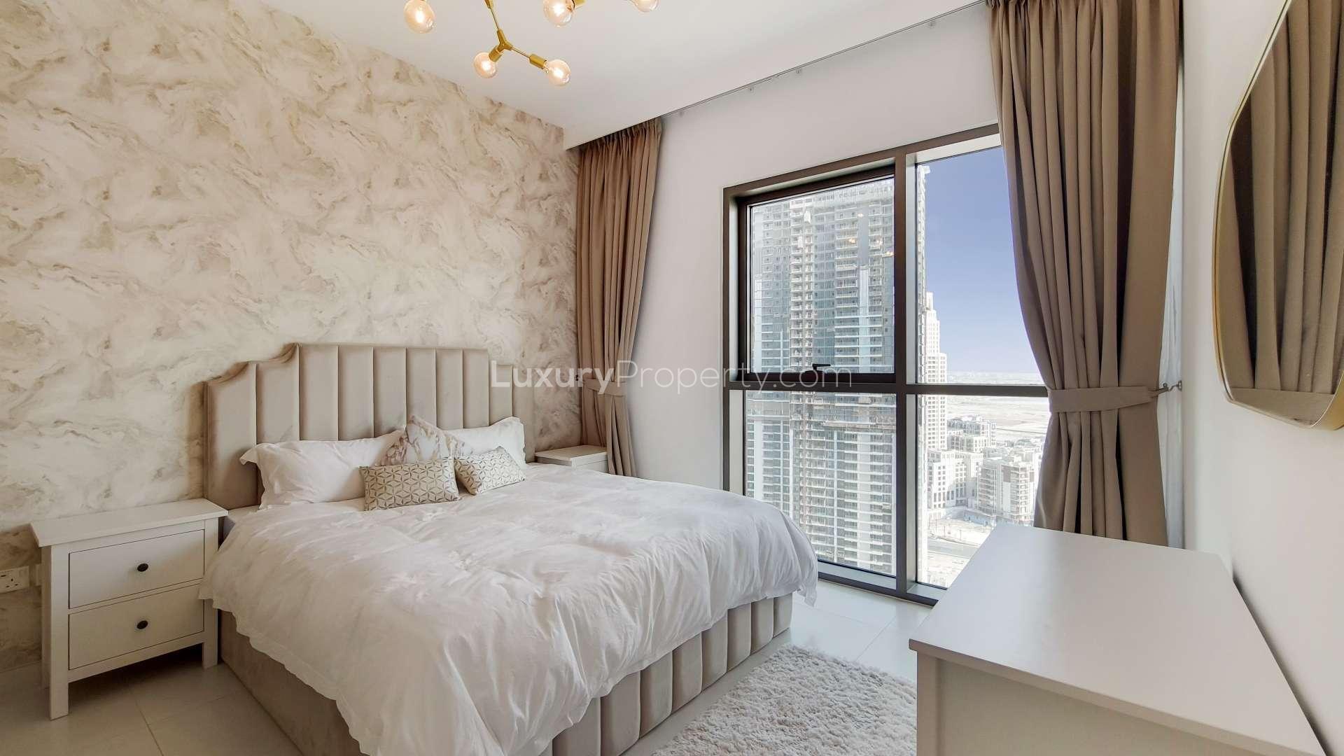 Modern kitchen and dining area in Creek Harbour furnished apartment, featuring sleek design elements