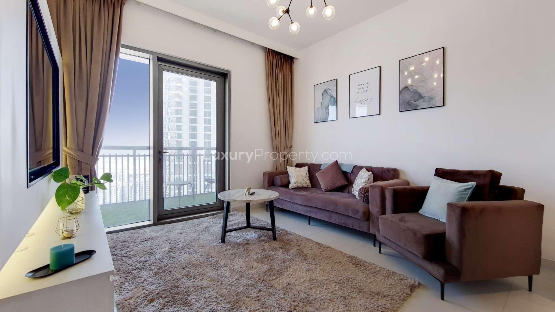 Mid-floor furnished apartment in Creek Harbour with modern kitchen and balcony view