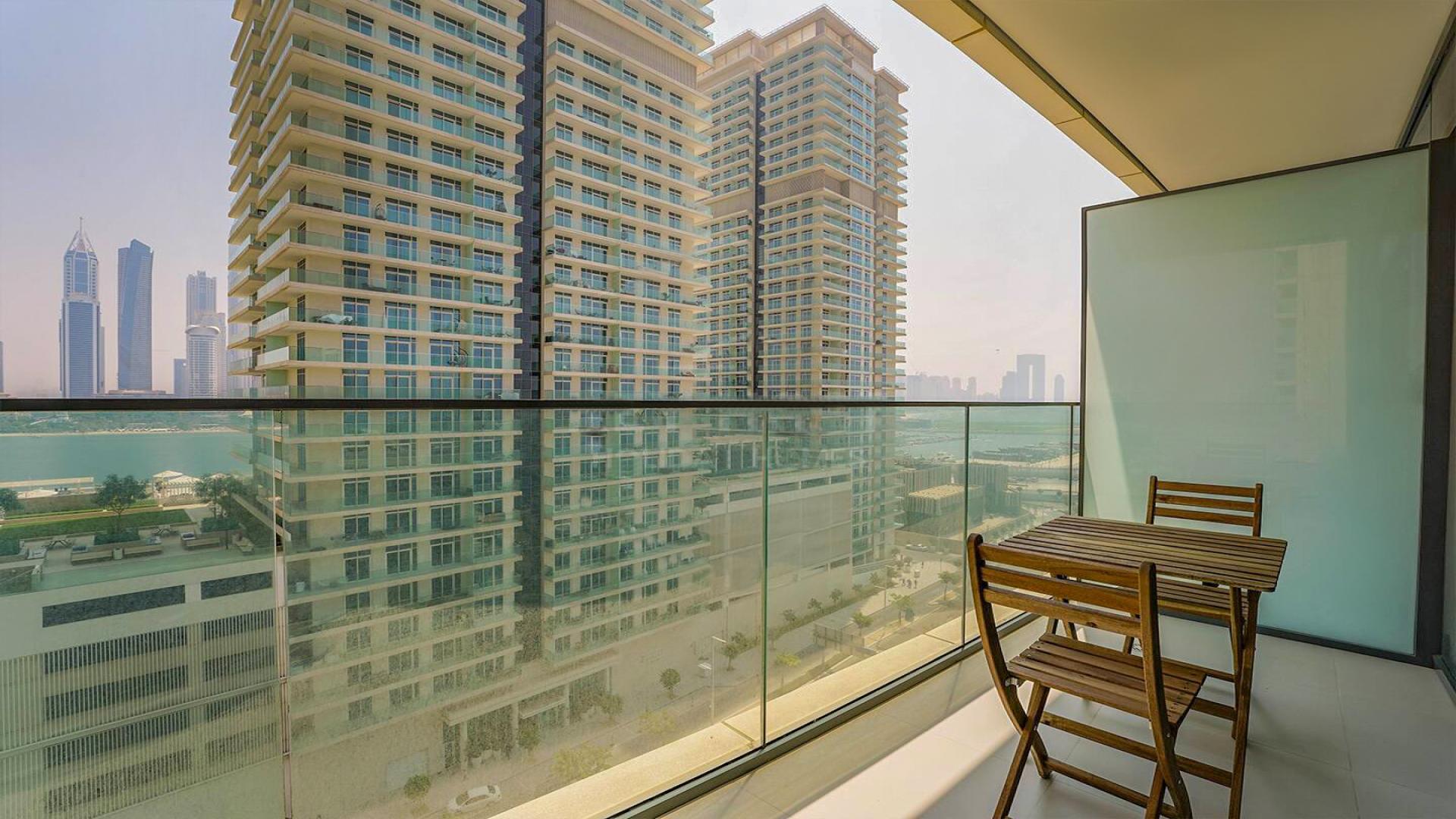 Brand new furnished apartment living room with balcony in Emaar Beachfront, Dubai Harbour