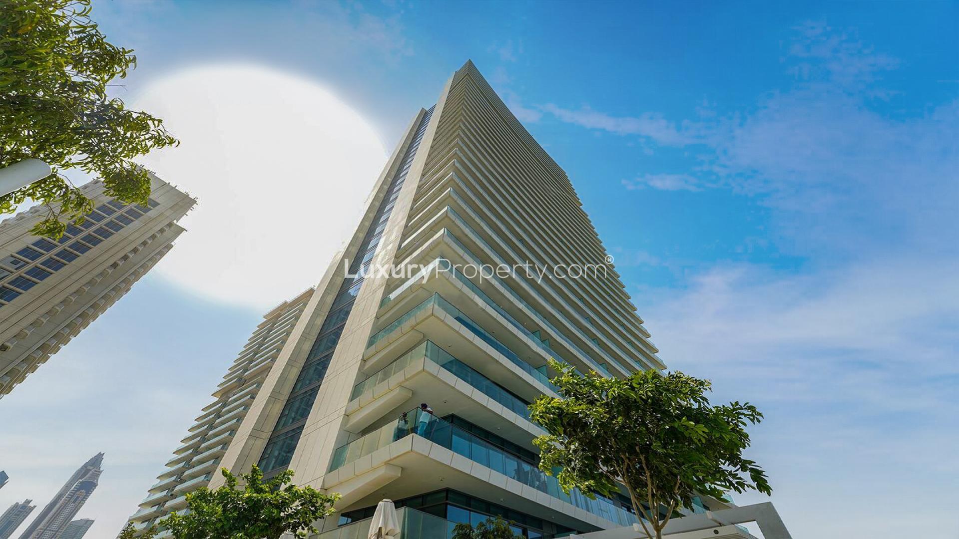 Balcony view from furnished apartment in Emaar Beachfront, Dubai Harbour, overlooking skyscrapers and sea