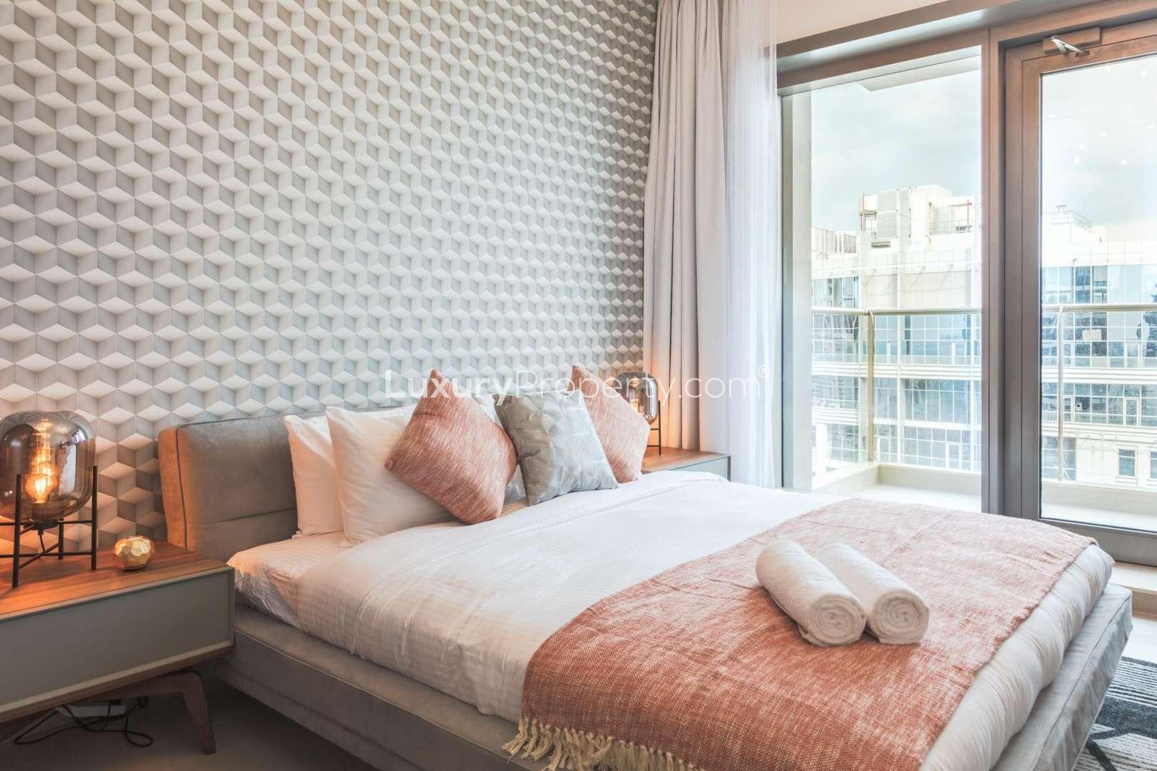 Balcony view from 1-bedroom apartment in Sparkle Towers, Dubai Marina, overlooking the cityscape