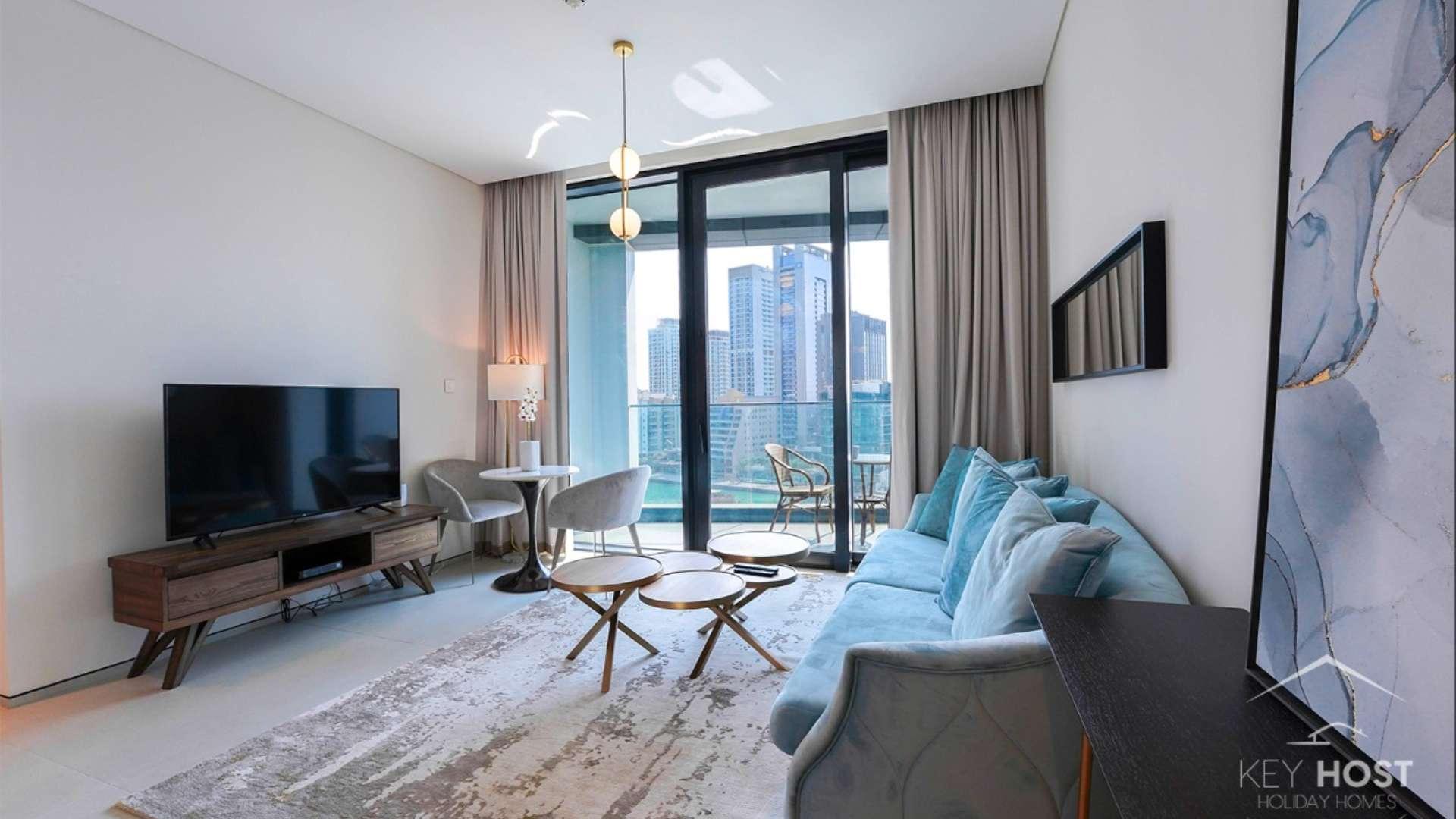 Contemporary living room with marina view in Jumeirah Beach Residence apartment for rent