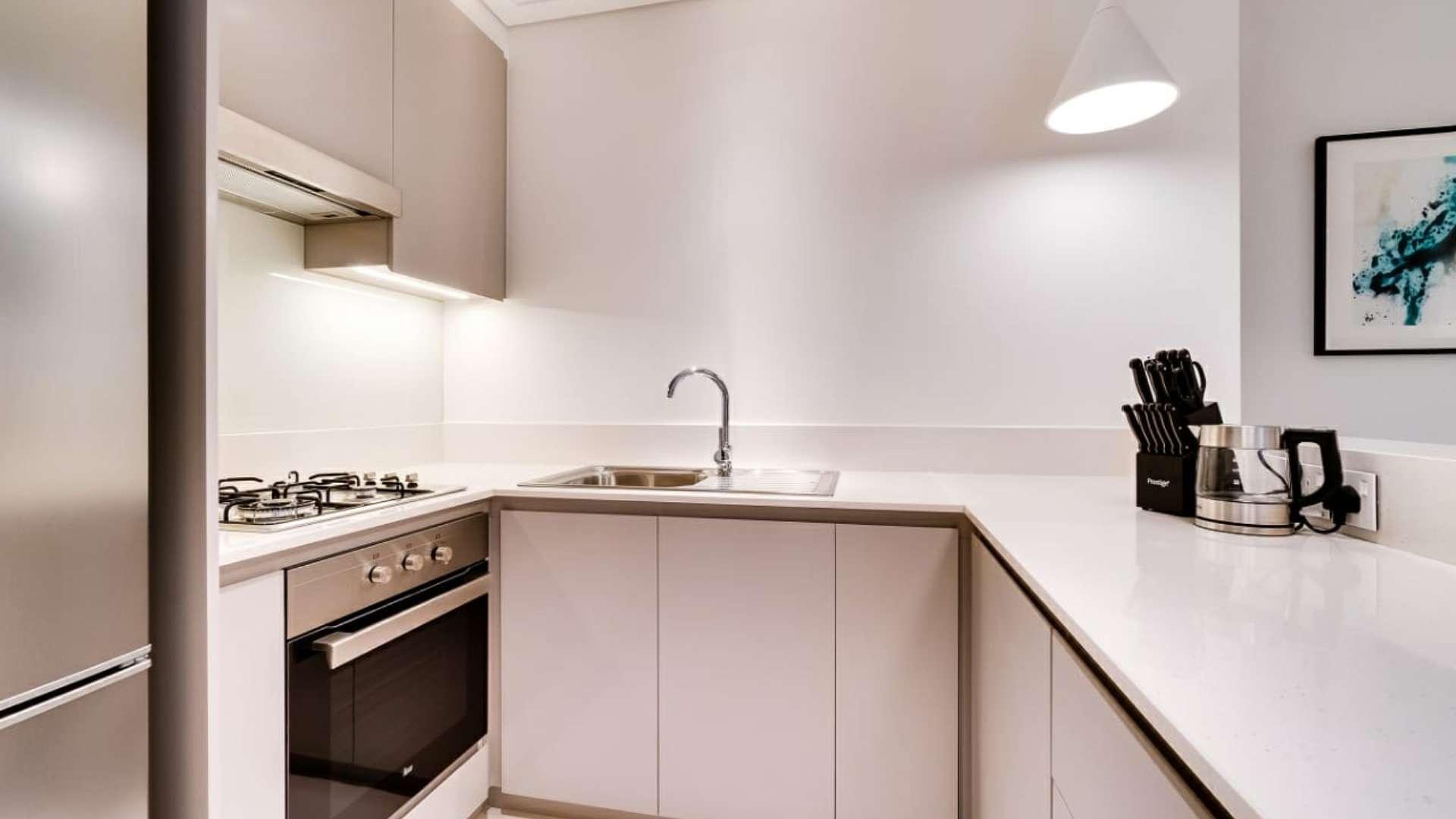 Modern living room in Vida Residence apartment, Downtown Dubai, featuring elegant furniture and decor