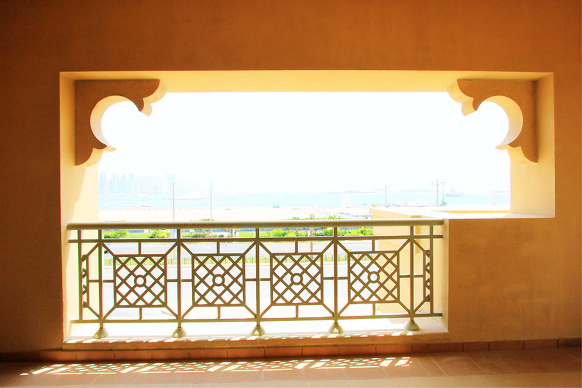 Spacious living room with large windows in Golden Mile 8 apartment, Palm Jumeirah