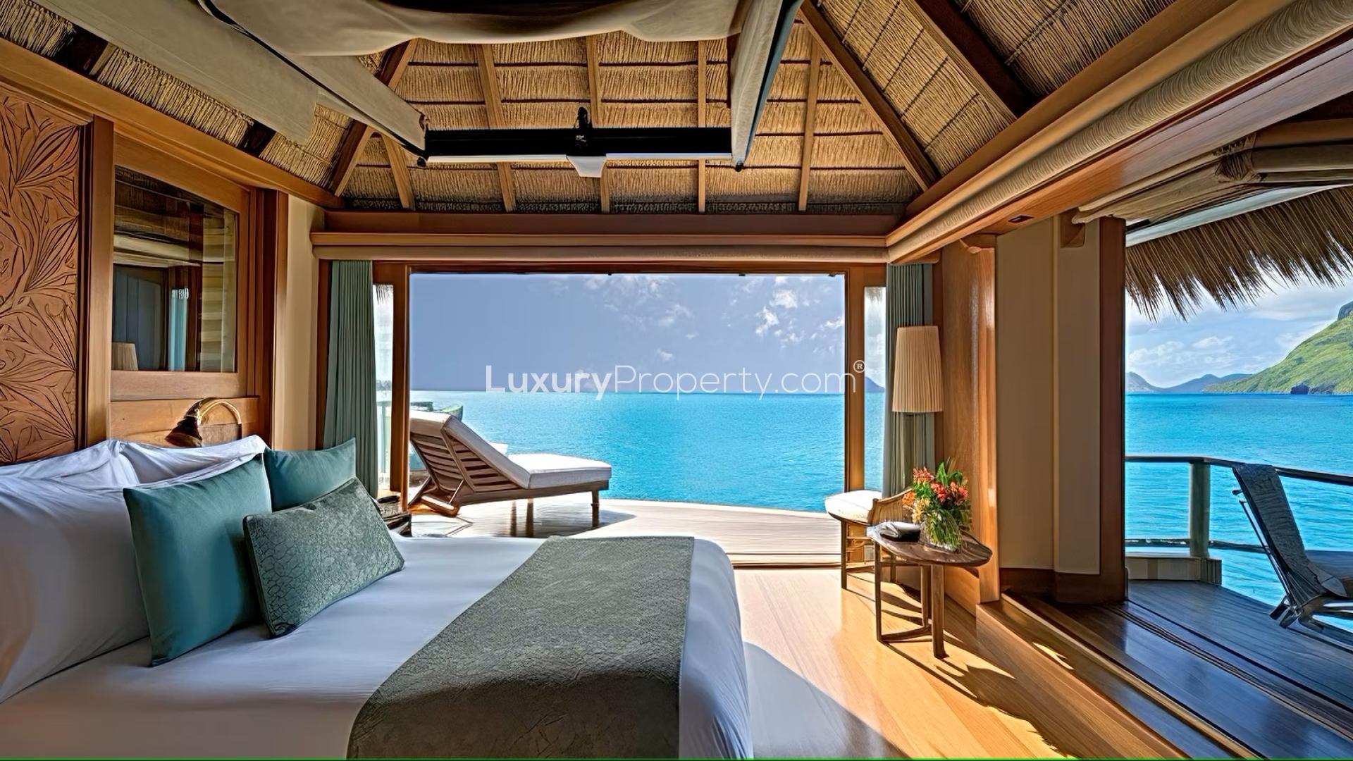 "Luxurious waterfront villa at sunset, Havannah Harbour, Vanuatu - Frangipani Beach Pavilions.","Luxurious waterfront bedroom view at Frangipani Beach, Havannah Harbour, Vanuatu property for sale.",Prime waterfront land view at Frangipani Beach, Havannah Harbour, Vanuatu for sale.