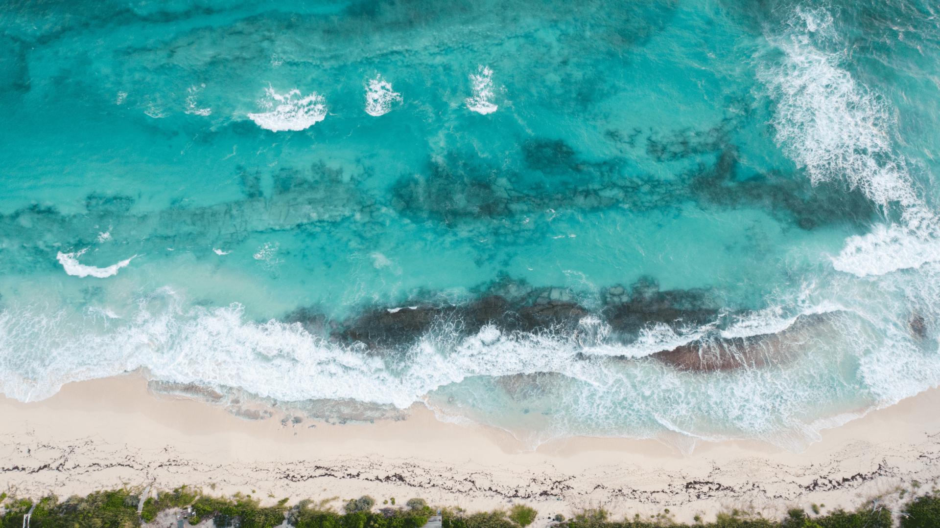 Aerial view of pristine beach near Baker’s Bay, Abaco Islands, Bahamas land for sale.