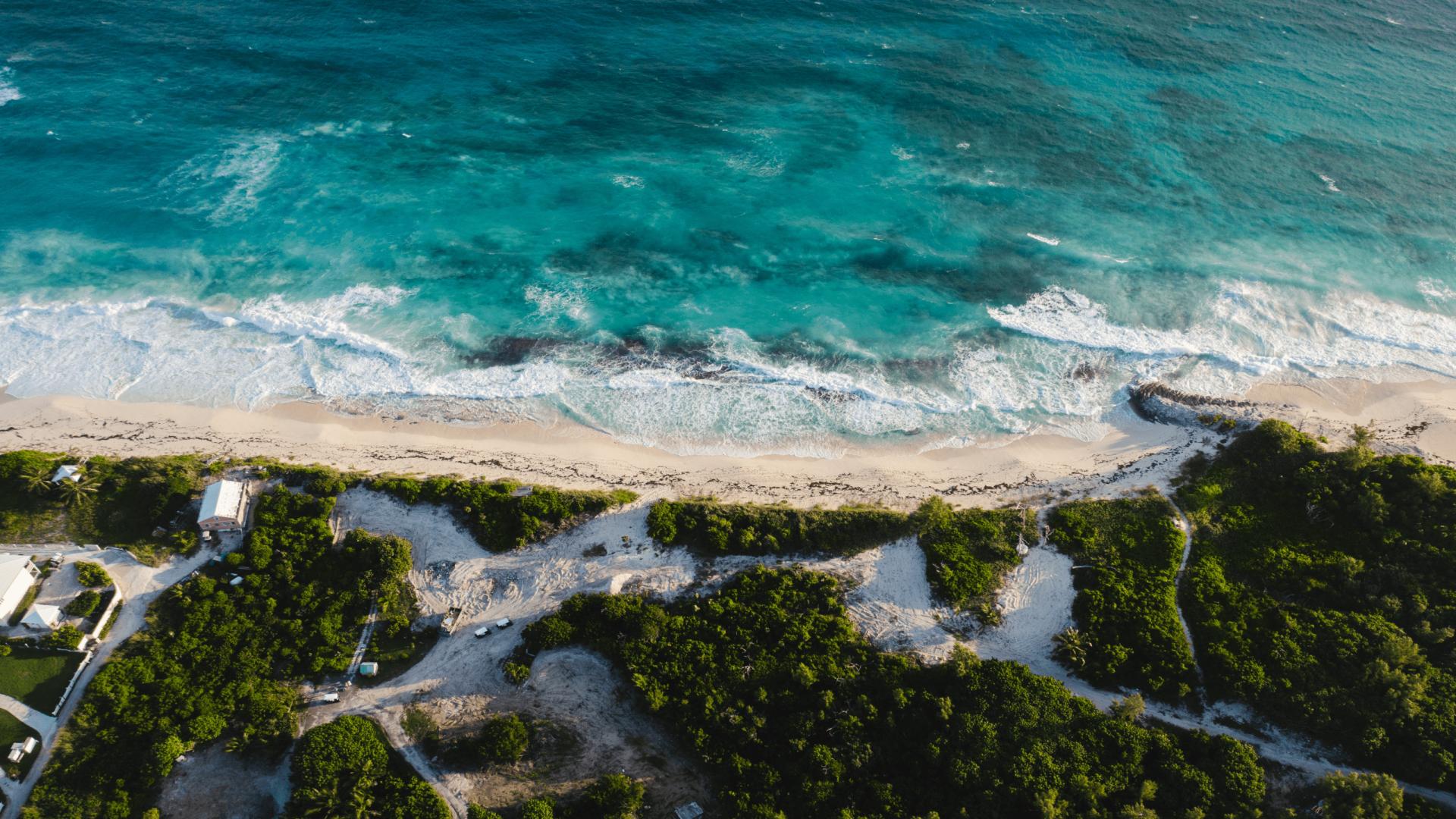 Aerial view of beachfront land for sale in Bakers Bay, Abaco Islands, Bahamas
