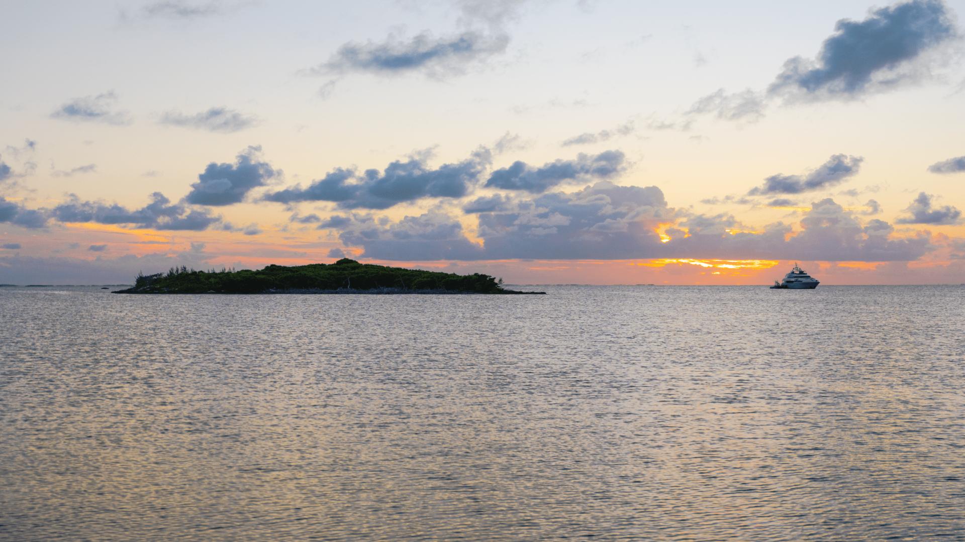 Sunset view from dock on scenic 3-acre cay, Abaco Islands, Bahamas