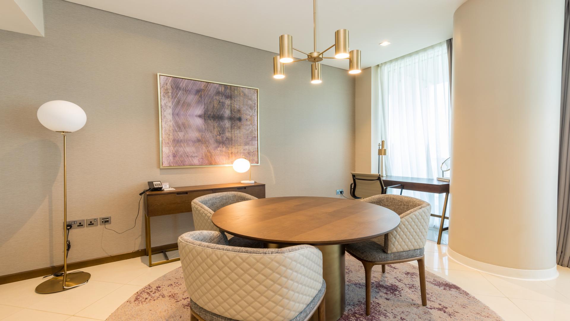 High-end stylish apartment living room with modern kitchen in Dubai Festival City